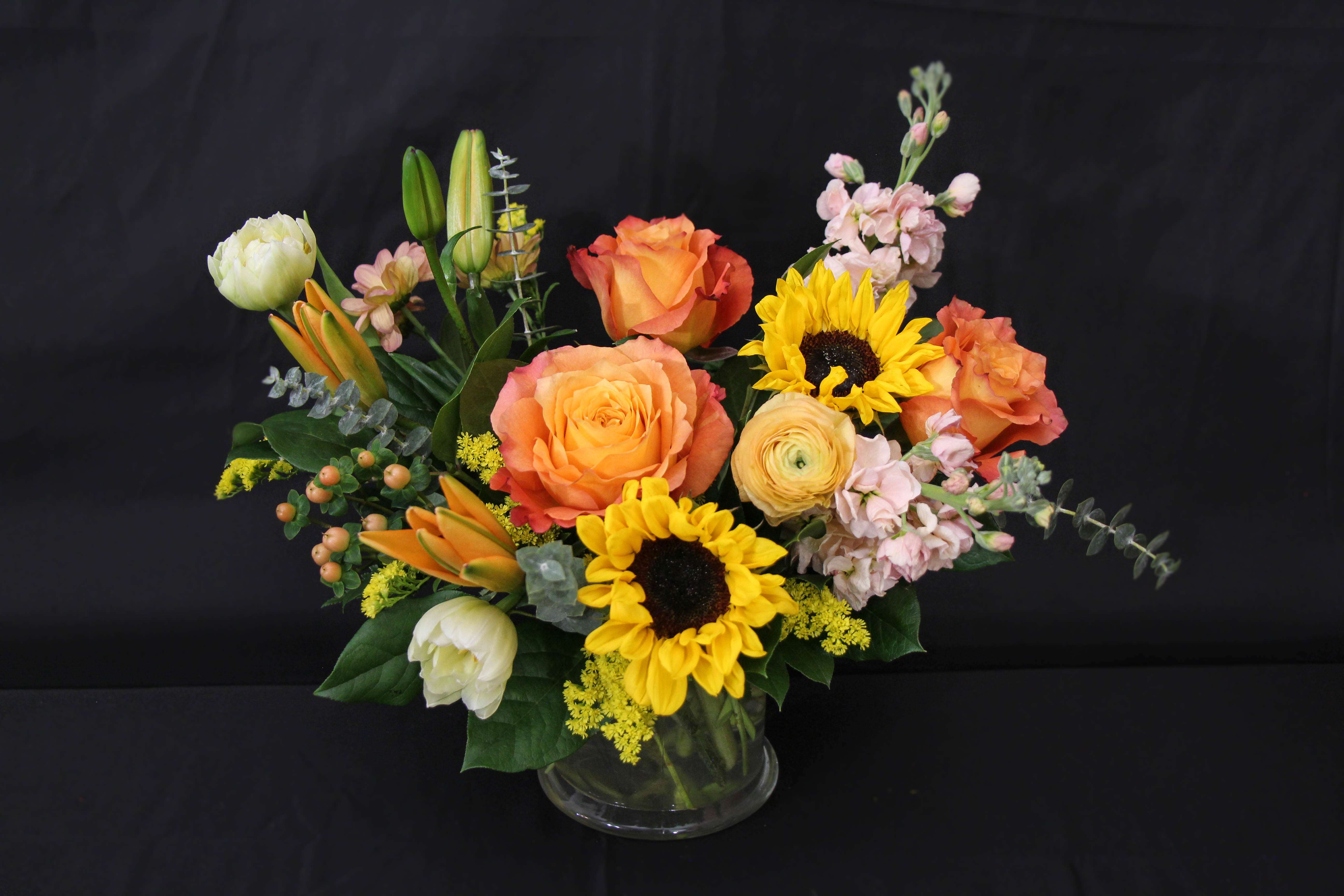 Dreamsicle Dreamsicle - Bring some bright fun colors to the one you love. This little arrangement is all you need to put a smile on someone's face.