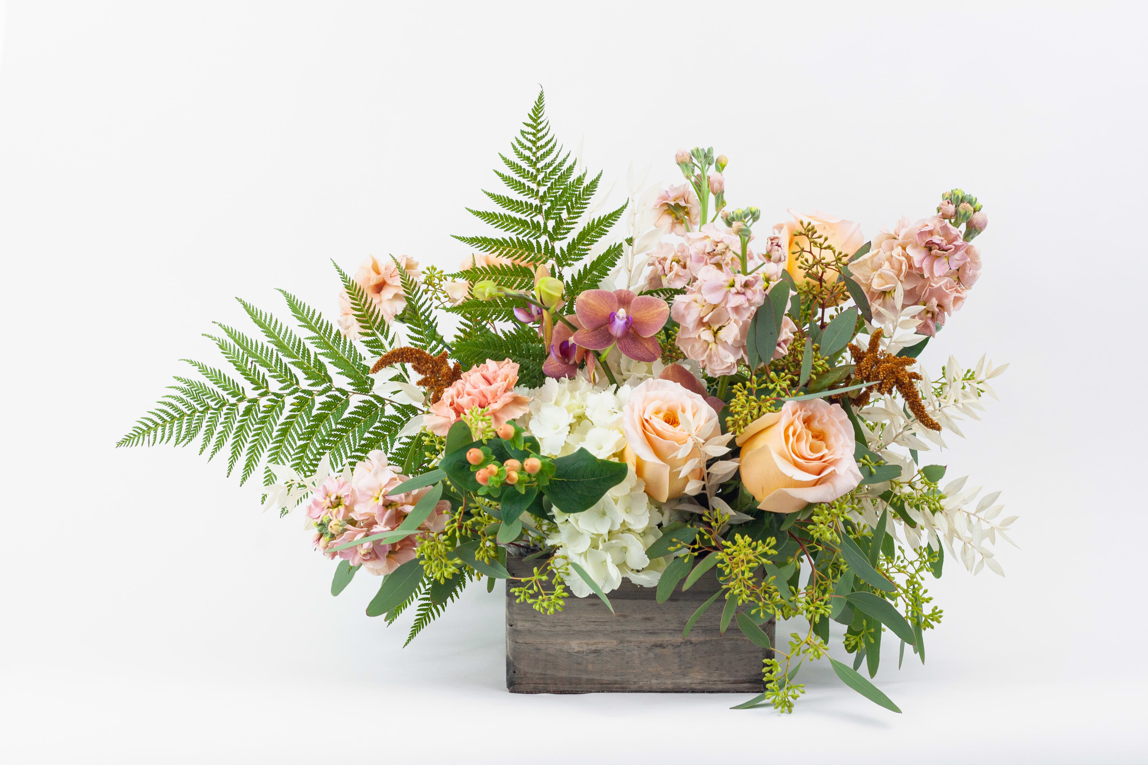 Peach Surprise - Peach Surprise design is made of all white and peach flowers. Perfect for someone who loves pastel tones. 