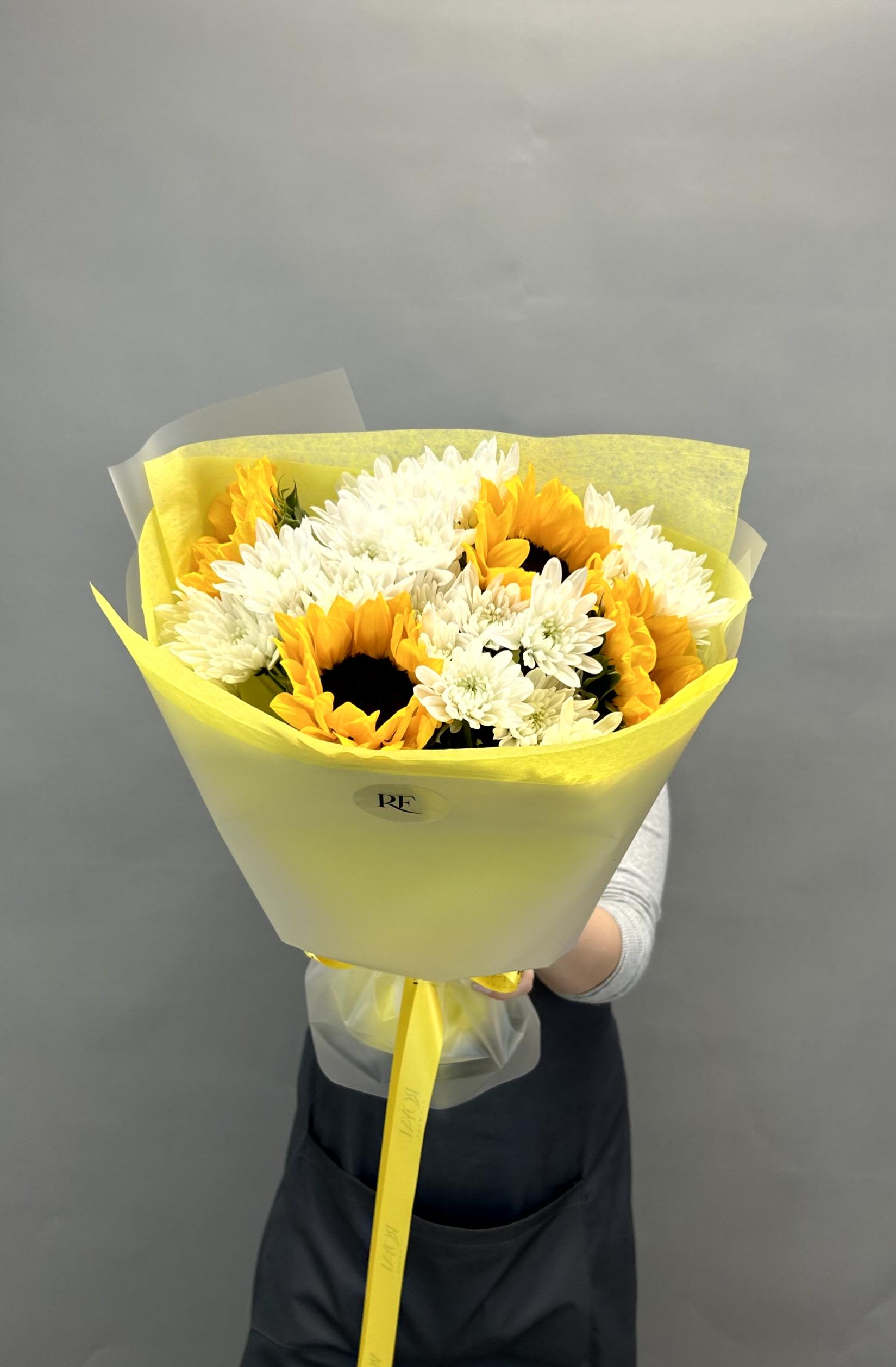 Sunny Cheer Sunny Cheer - A bright and joyful pairing of sunflowers and cushions, perfect for spreading warmth and smiles.
