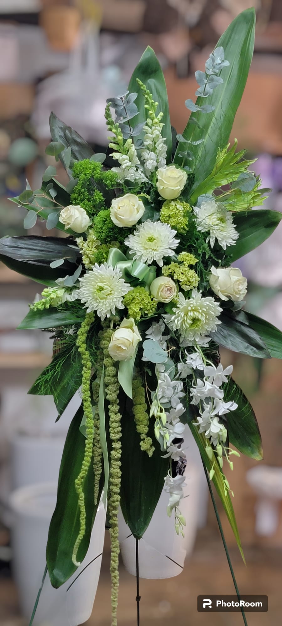 Green Garden Spray Green Garden Spray - green hydrangea, white roses, green trick dianthus, and white snap, are accented with bupleurum, myrtle, sword fern, variegated aspidistra leaves, aralia leaf, bear grass, and lemon leaf, green amaranthus.
