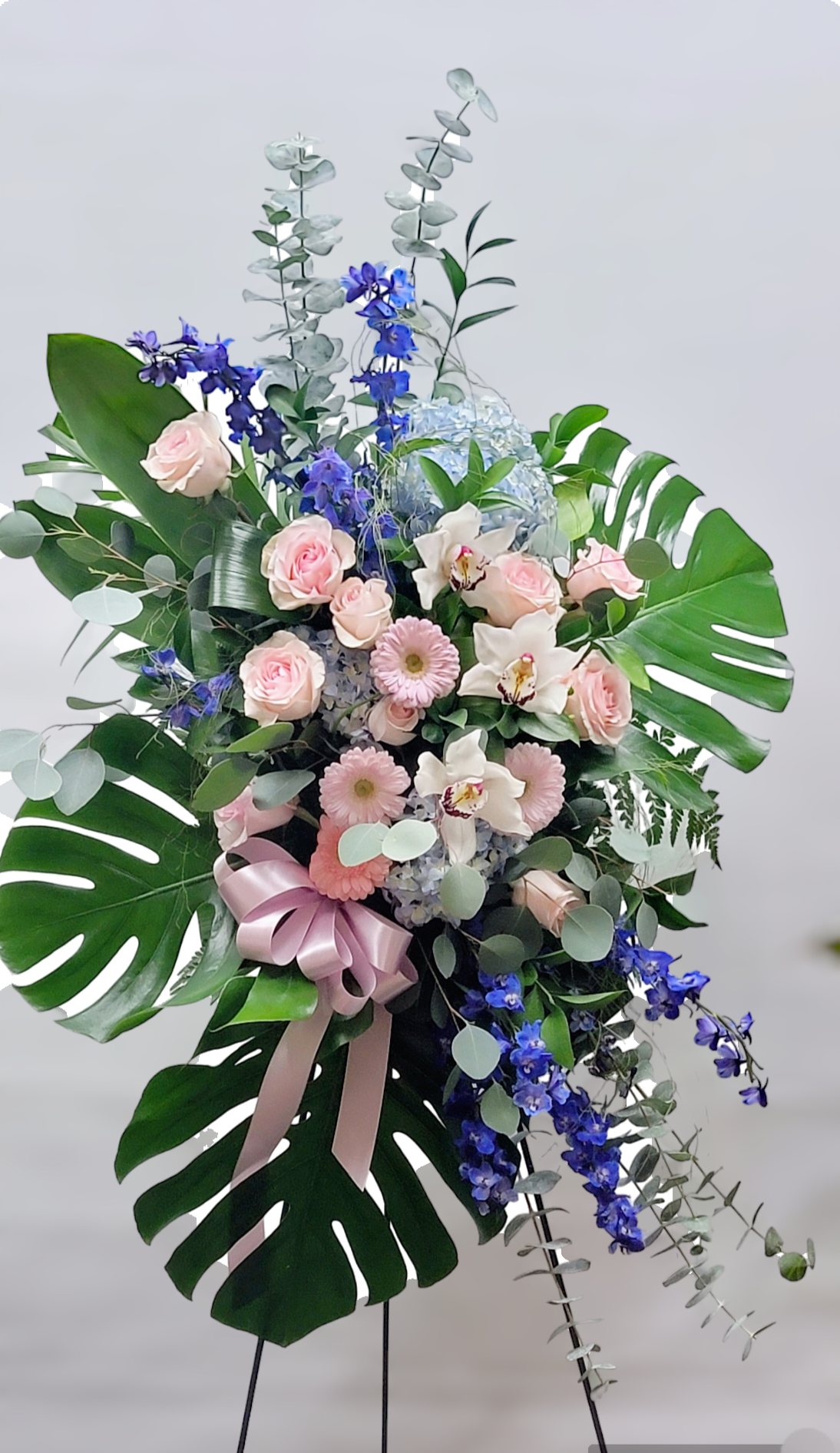 Sunshine Sunshine - Monstera. Roses. Gerbera. Eyc dollar. Blue Delphinium