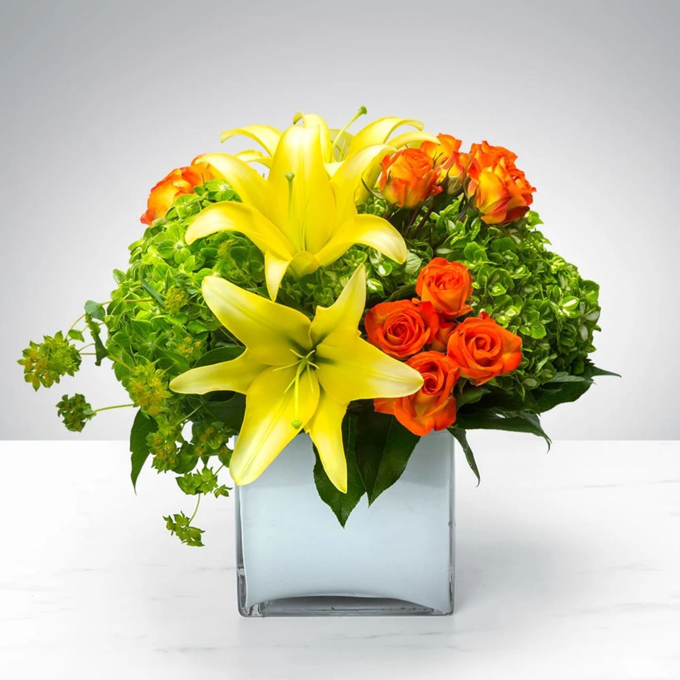 Cube of Wonder by BloomNation™ Cube of Wonder by BloomNation™ - Do you find yourself wondering what’s in this Cube of Wonder? Wonder no longer, you’ve come to the right place. Featuring a vibrant array of lilies, spray roses, and hydrangea, this wonderful arrangement is the perfect gift to celebrate a birthday or new beginnings.