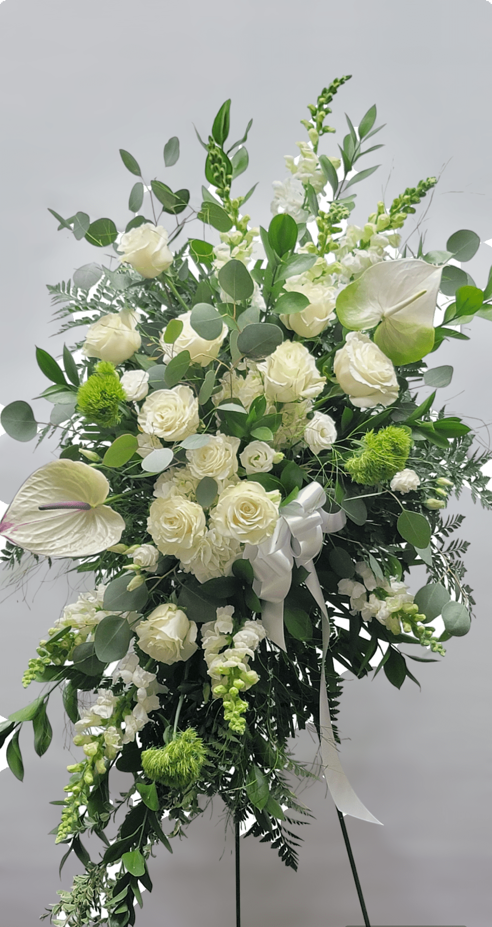 White spray White spray - White roses. Anthurium. Euc dollars. Green Ball. Ruscus. Snap