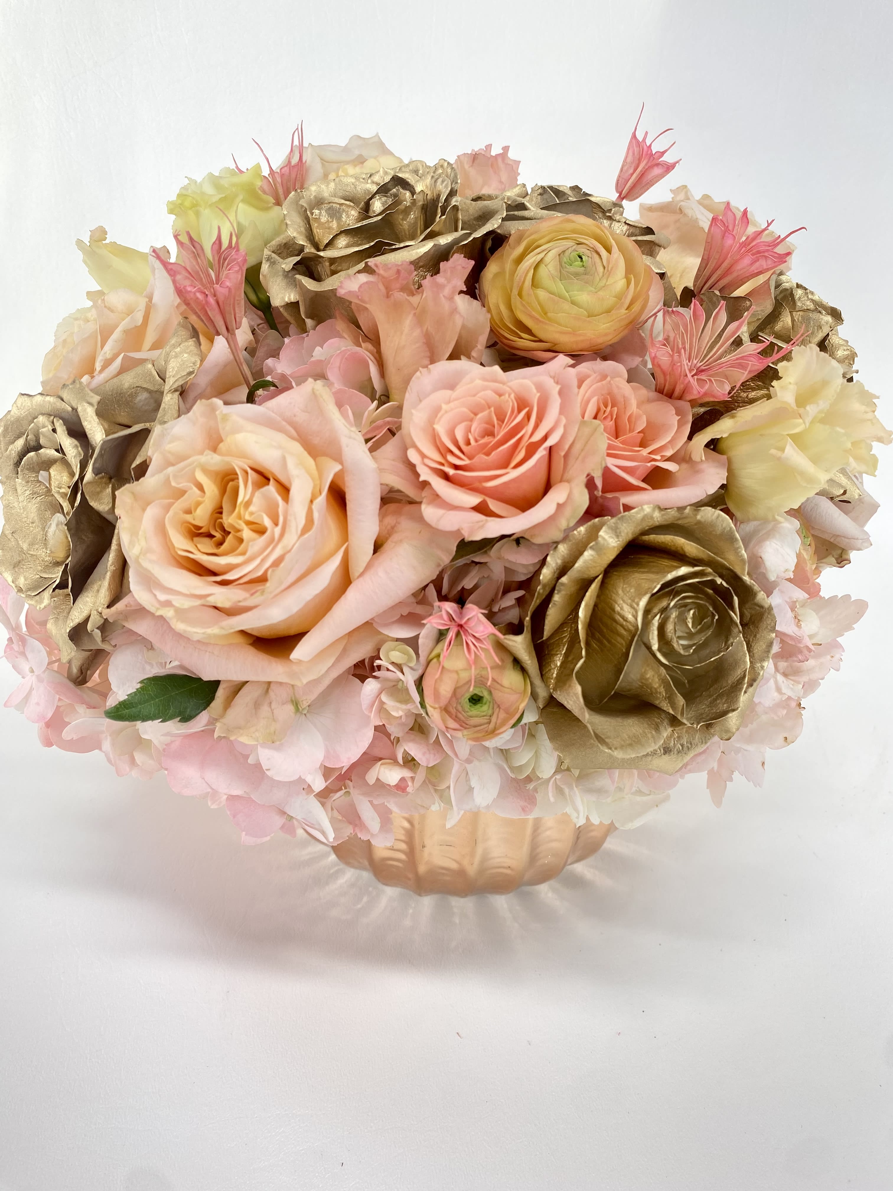 Soft n’ Dreamy Soft n’ Dreamy - Feminine, soft n’ dreamy flower arrangement. A mix of Hydrangeas , garden spray roses, and two tone of roses.