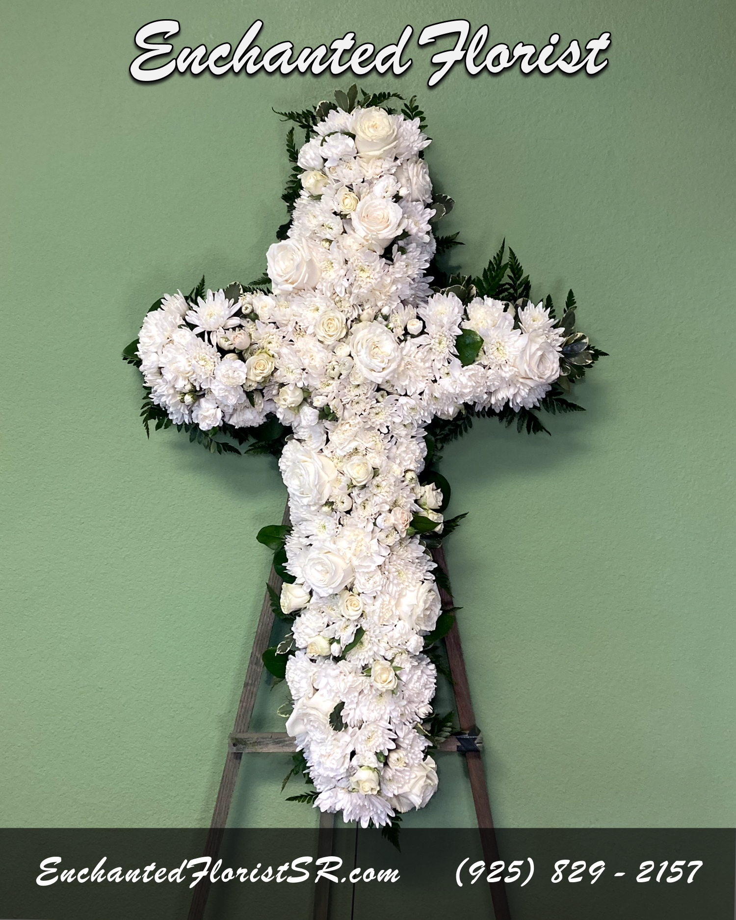 Eternal Faith - Standing Cross - 'Eternal Faith' is an elegant Standing Cross that arrives delivered on an easel, showcasing an all-white ensemble of flowers that form the shape of a cross, and featuring Roses, Carnations, Spray-Roses and 'Cushion' Chrysanthemums. All side edges of the shape of the cross are accented with verdant Leather Fern and freshly cut Pittosporum.  Arrives In: 1 wooden easel  Orientation: One-Sided  Approximate Dimensions: Height: 26&quot; Width: 16&quot;