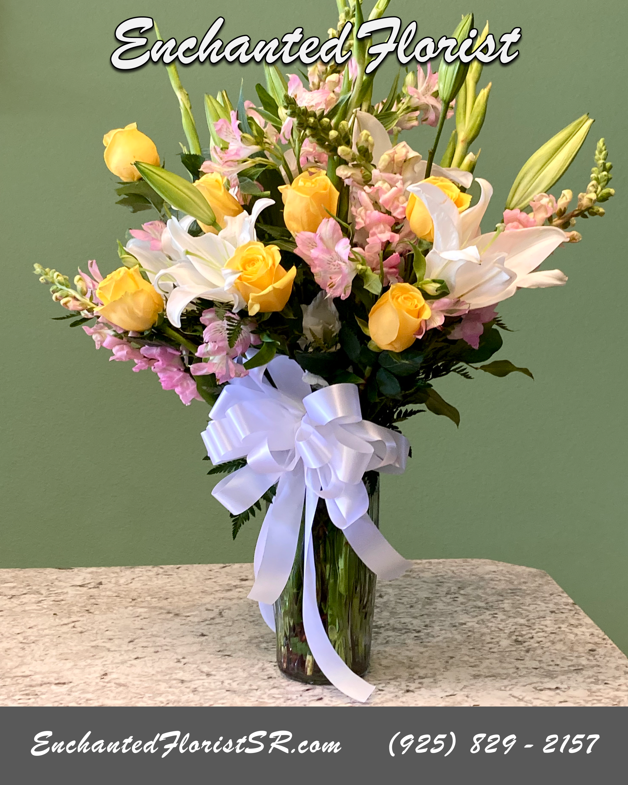 Sunshine - Mixed Arrangement - Sunshine is a radiant mixed arrangement that showcases a bright palette of yellow, pink and white flowers that are sure to shine some light on those you're thinking of. Featuring white astatic lilies, yellow roses, yellow carnations, white snapdragons, pink alstroemeria and white Gladiolas, accented with lush green lemon Leaf.  Arrives In: Crystal glass rose vase  Orientation: One-Sided  Approximate Dimensions: 26&quot; Tall 14&quot; Wide 8.75&quot; Vase Height