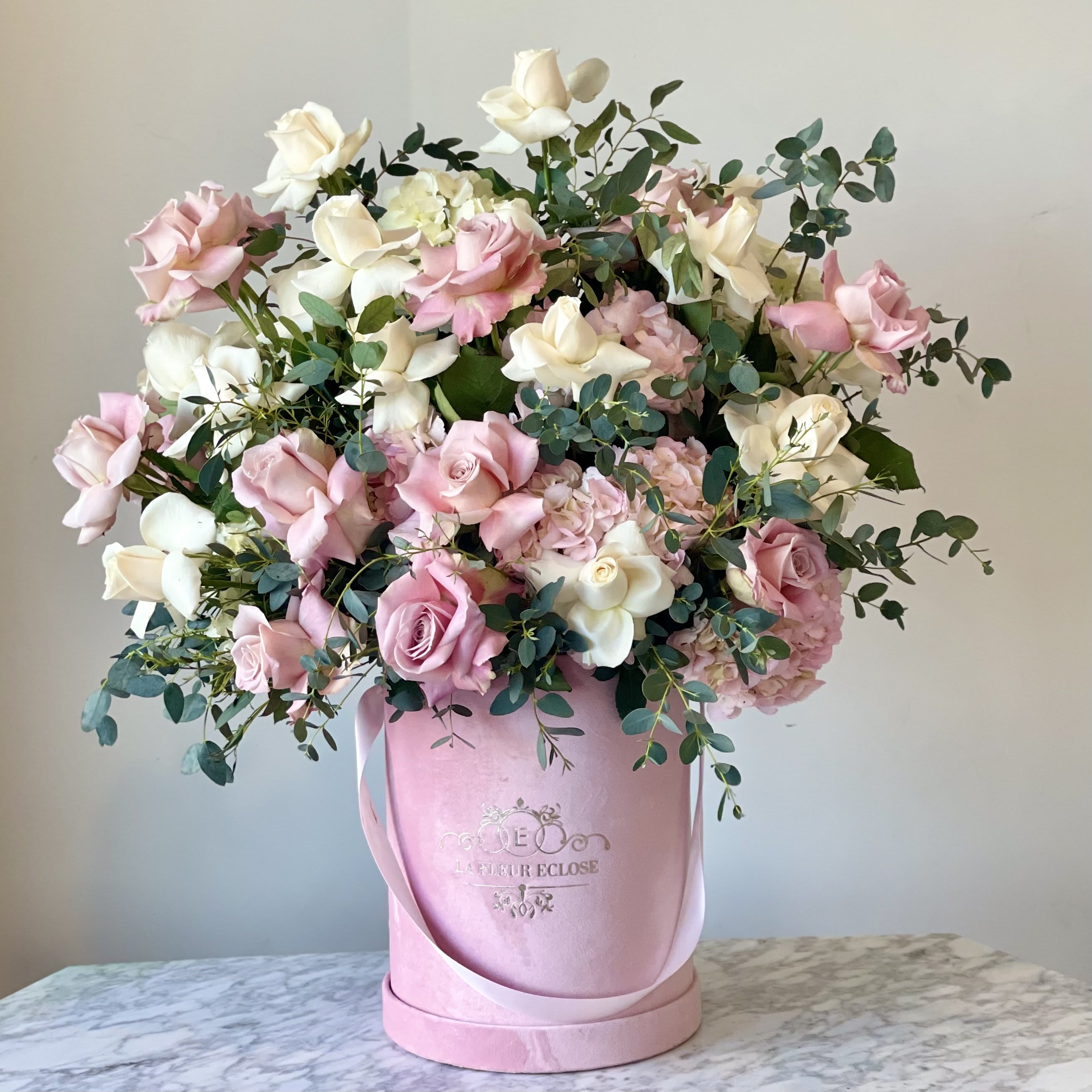 Natural Beauty  - Beautiful pink and white roses in our signature box.