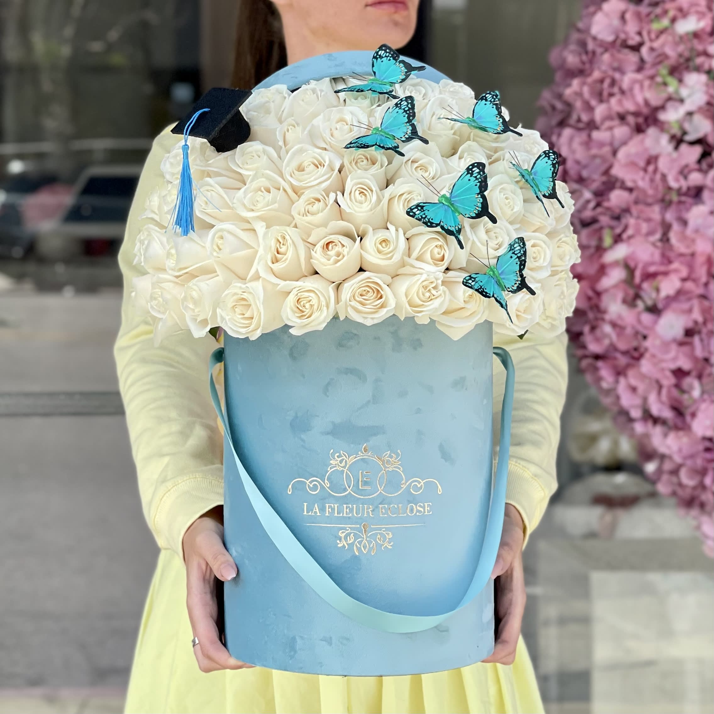 Graduate with Class - Standard 50 white roses in turquoise box Deluxe 75 white roses in turquoise box