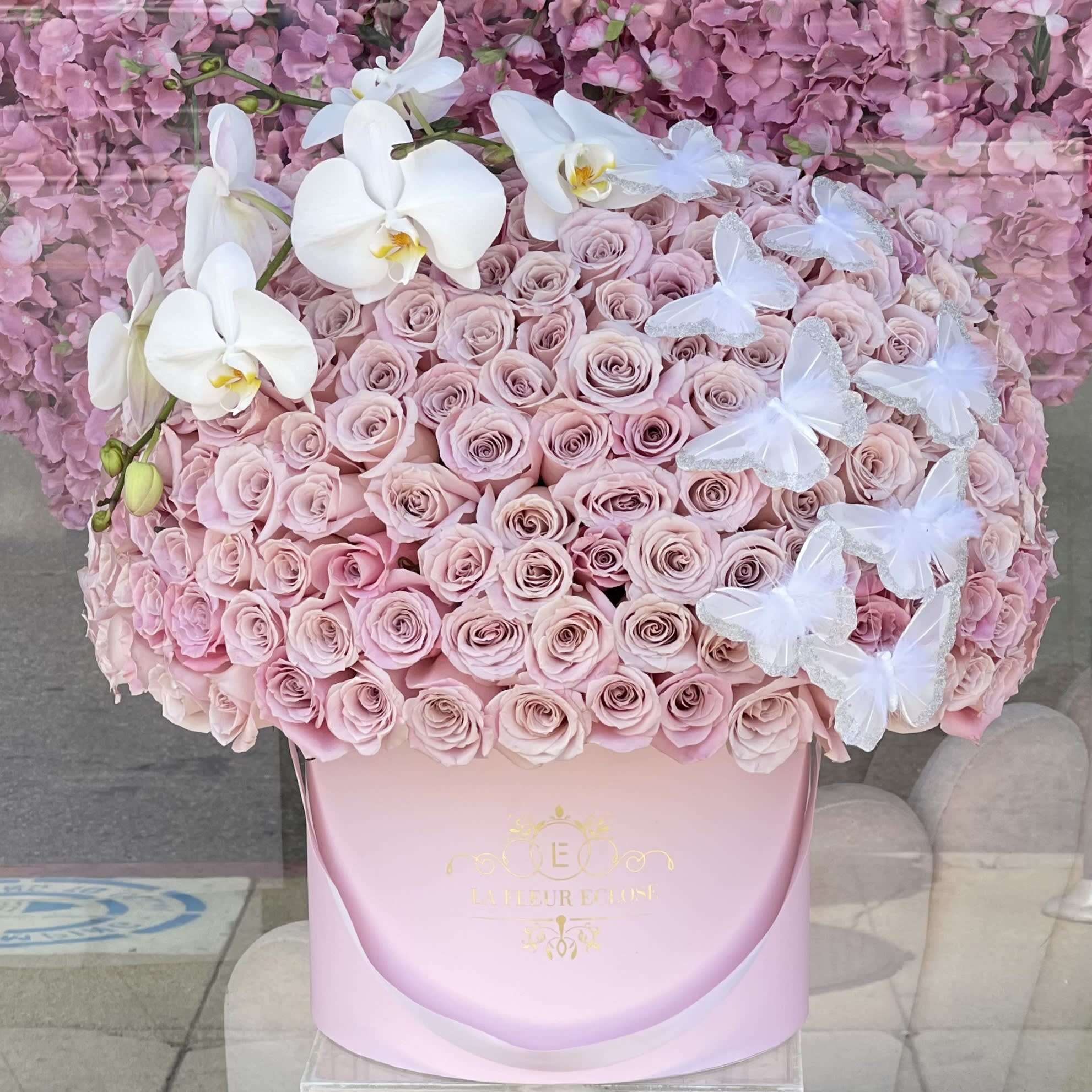 Your favorite part V  - Fresh Faith roses in our velvet signature box with the orchid and butterflies on the top Standard-150 roses Deluxe- 200 roses Premium- 250 roses 