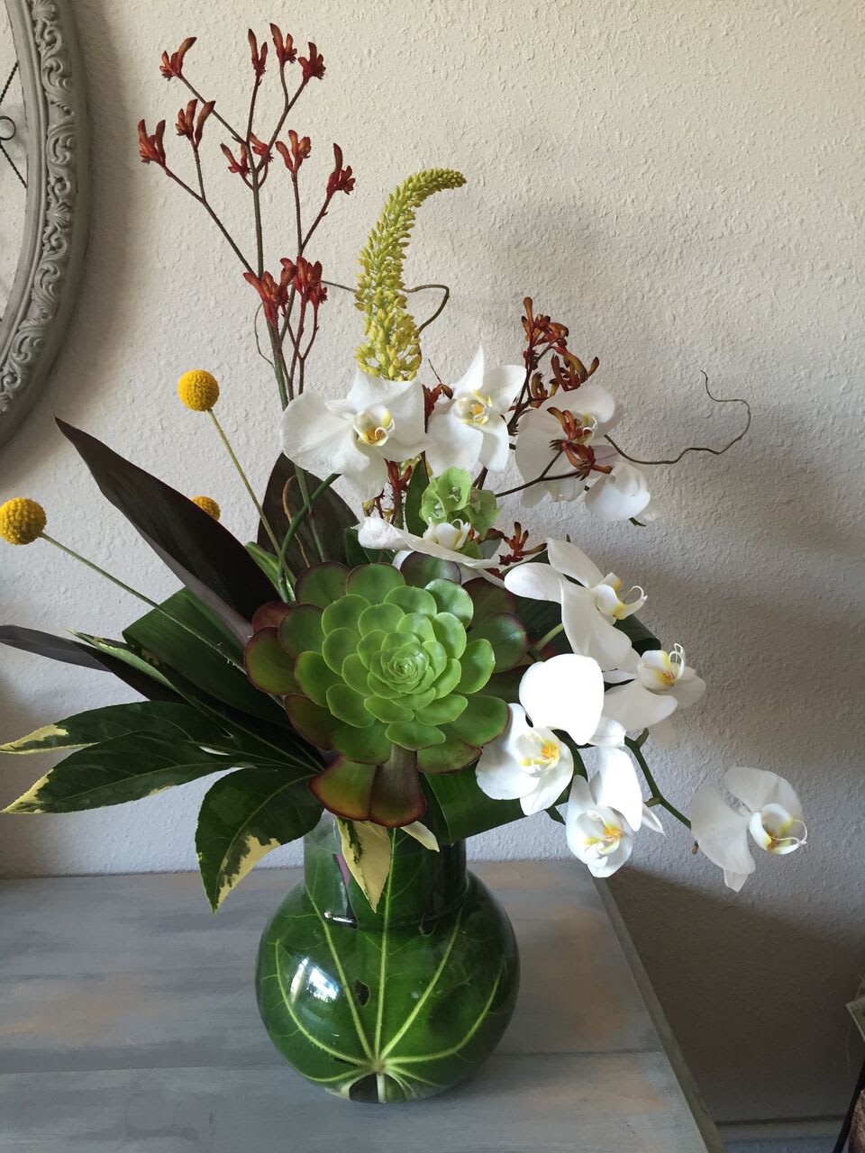 Orchid Bouquet Orchid Bouquet - Bouquet with phalaenopsis orchids and succulent accents.