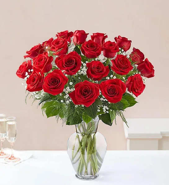 Ultimate Elegance™ Long Stem Red Roses - Our luxurious long stem red roses are the ultimate surprise to say “I love you.” Two, three or four dozen radiant blooms are artistically arranged by our expert florists inside an elegant glass vase and personally hand-delivered to help you say how you feel in a truly romantic way.  All-around arrangement with 24, 36 or 48 long stem red roses; accented with baby’s breath and assorted greenery Our florists select the freshest flowers available, so shade of rose may vary due to local availability Artistically arranged in a classic clear glass vase 48-stem arrangement measures approximately 25&quot;H x 20&quot;L 36-stem arrangement measures approximately 24&quot;H x 18&quot;L 24-stem arrangement measures approximately 23&quot;H x 16&quot;L  