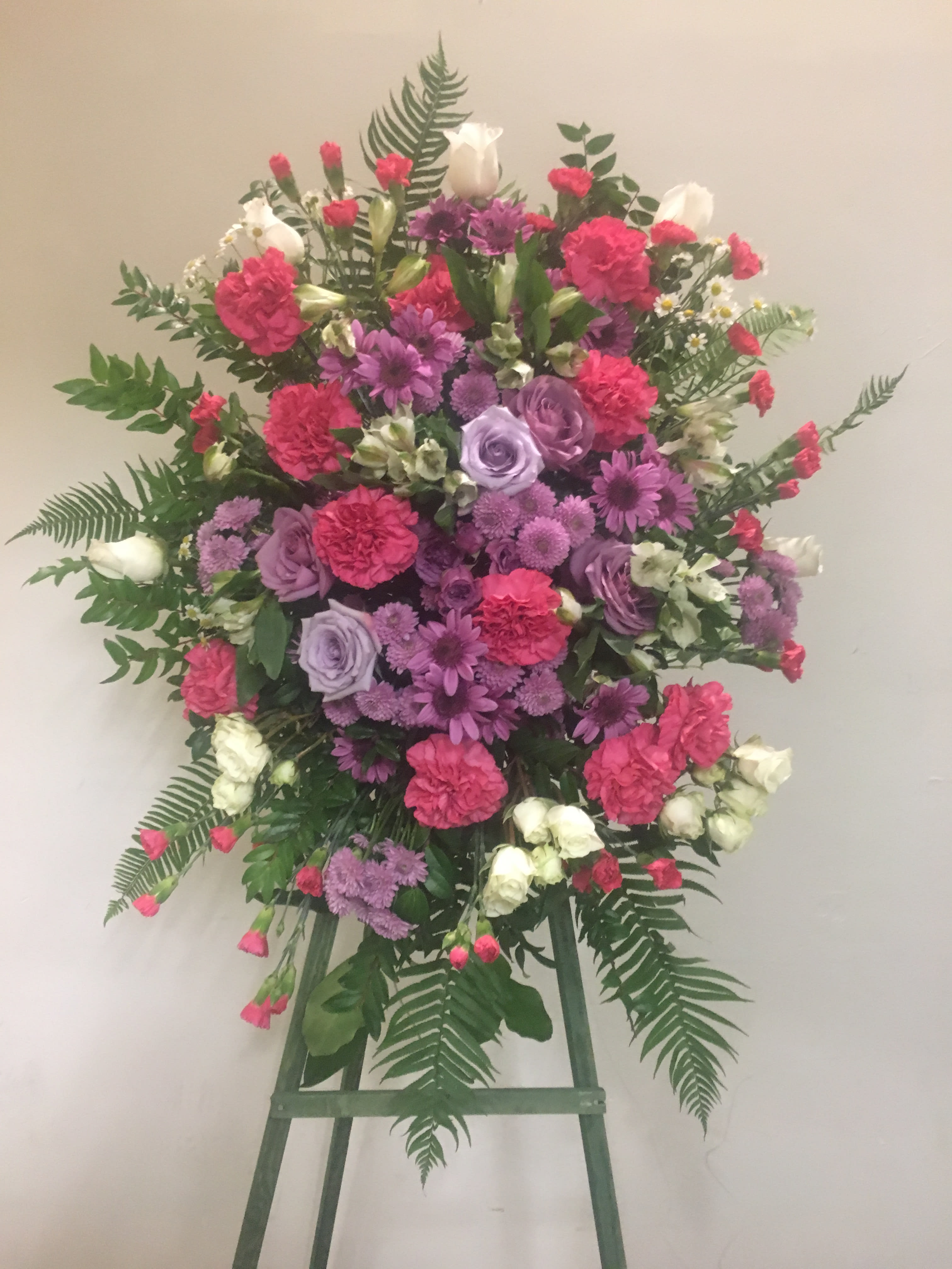 Beautiful Soul spray by Seulberger's Florist Beautiful Soul spray by Seulberger's Florist - A feminine mix of colors in shades of lavender contrasted with bright pink makes for a beautiful farewell.