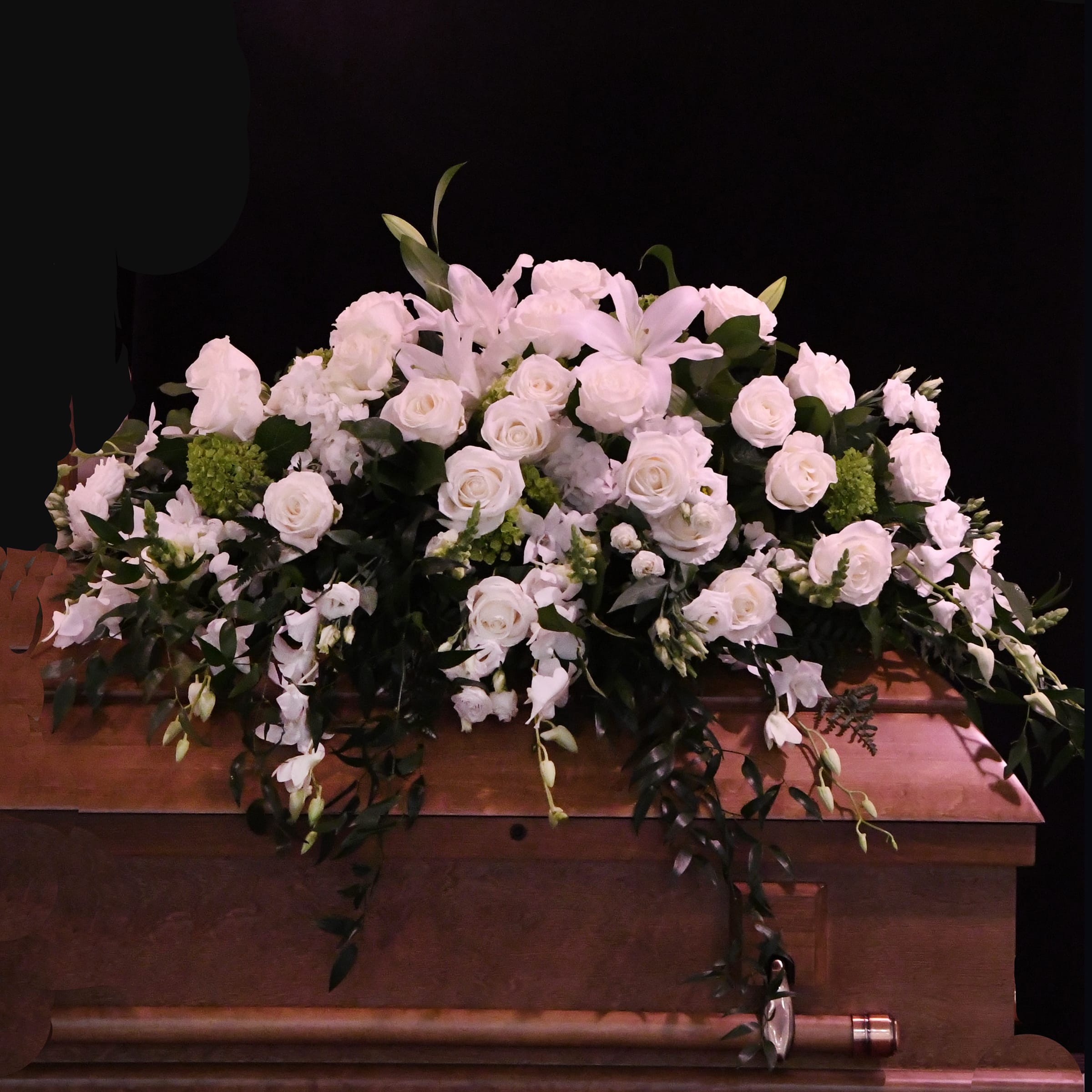 Classic White Casket Spray - A traditional arrangement of beautiful white blooms