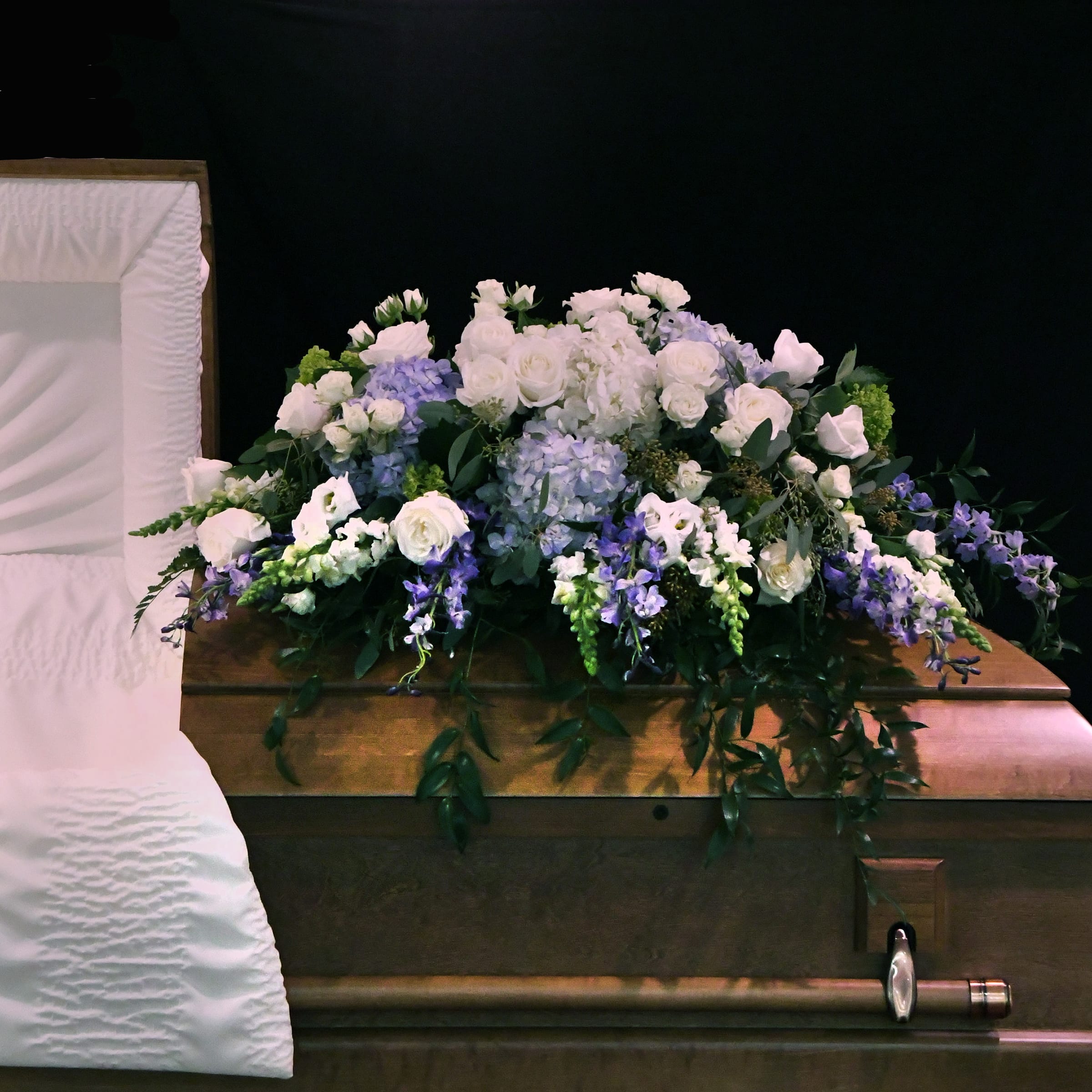 Ocean Breeze Casket - A beautiful spray of gorgeous blues and whites.  