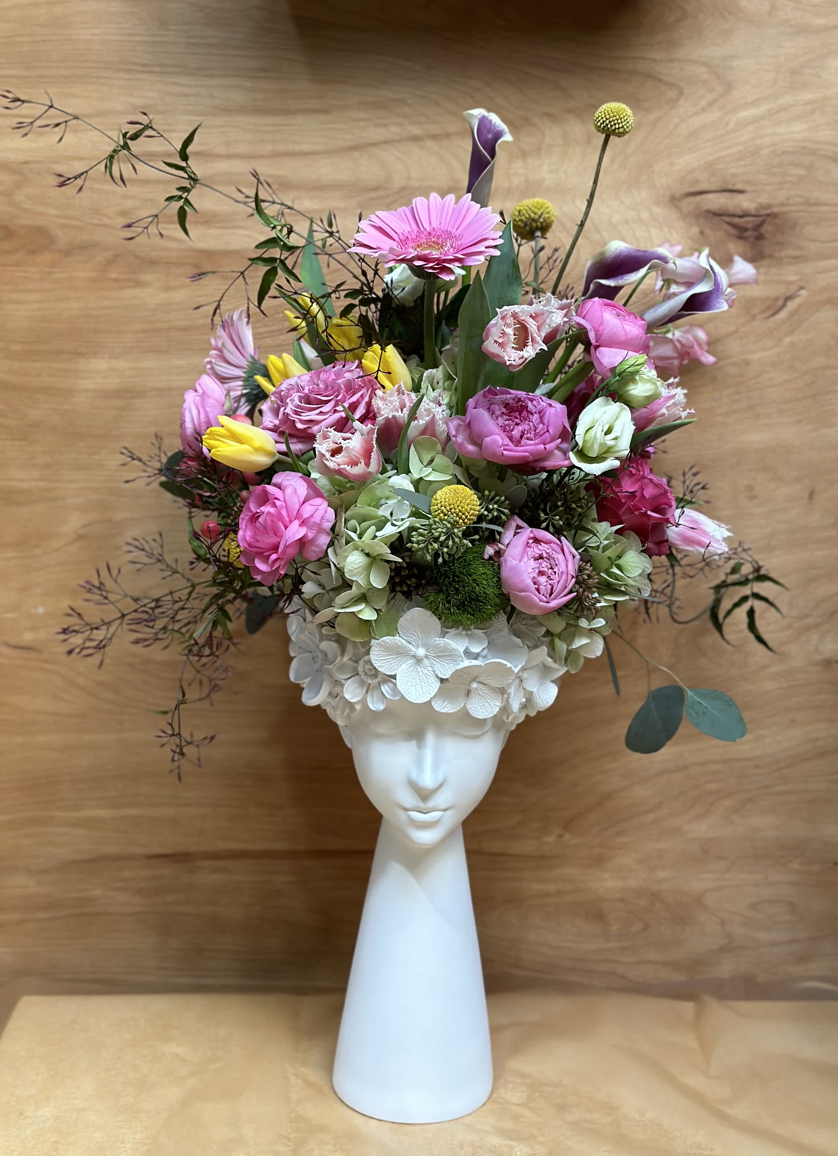 Mother Nature - Seasonal Florals will be gathered to create a beautiful display in our floral Mother Nature vase. The selection of flowers will vary in each arrangement based on availability.  Approx. Height ; 29&quot;
