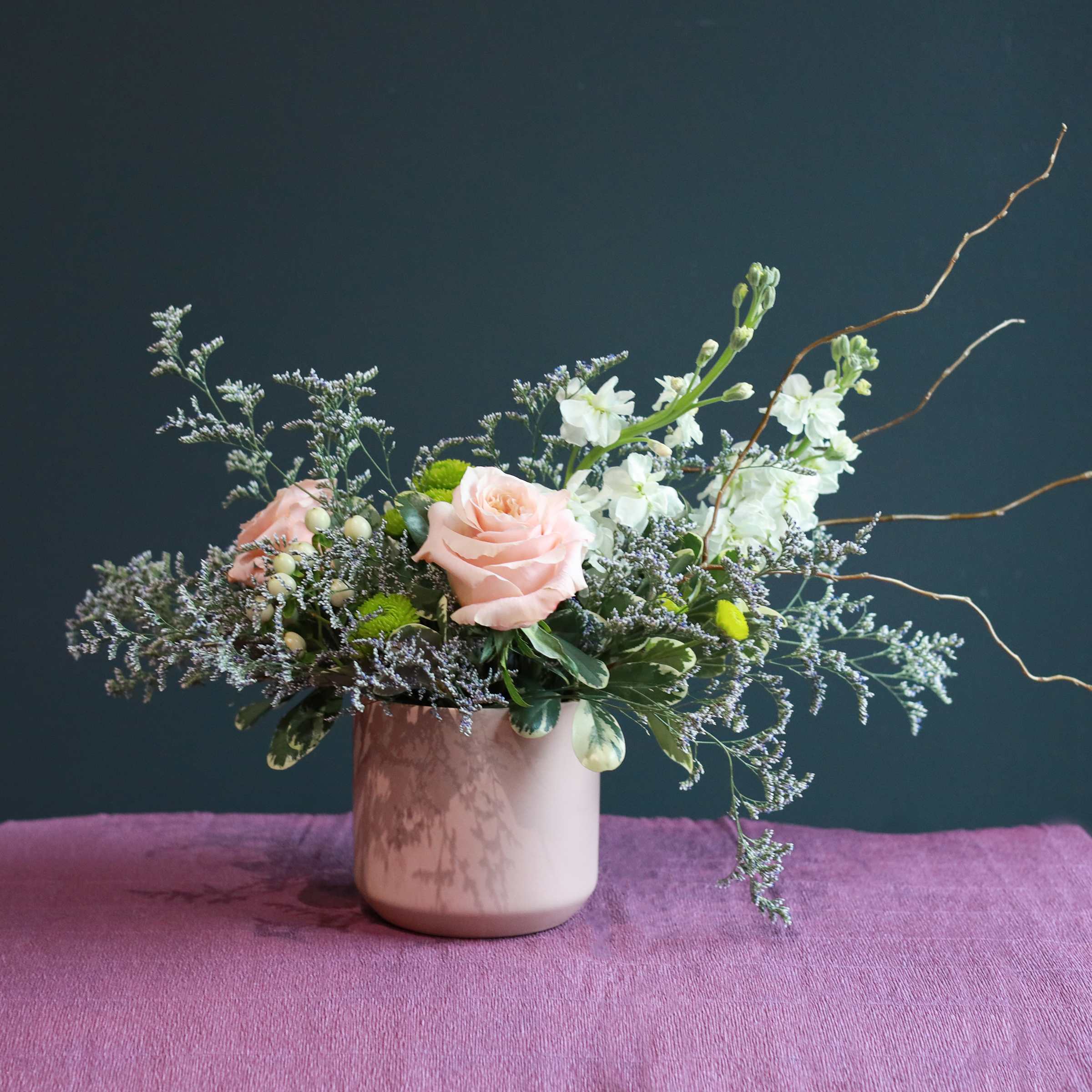 Peaches &amp; Cream - Celebrate Mom with the Sweetness of &quot;Peaches &amp; Cream&quot; with a delightful short bouquet that embodies her gentle spirit.  This is a charming arrangement overflowing with soft hues and delicate textures, sure to melt her heart.