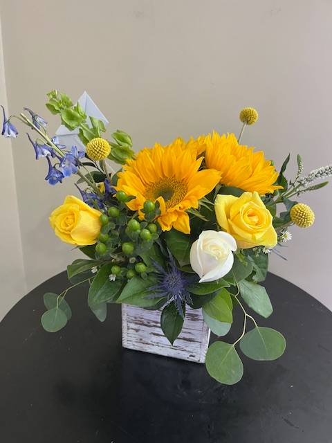 Mellow Yellow - Sunflowers, Yellow Roses, White Roses, light blue delphinium