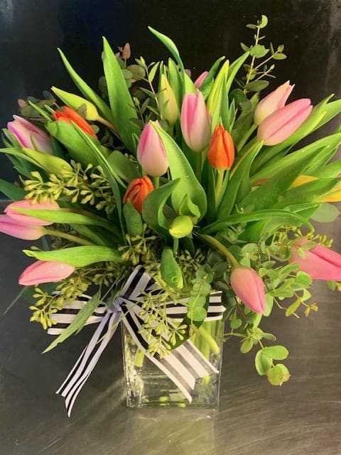 The Piety Street The Piety Street - Mixed tulips in a rectangle glass vase. Spring is here!