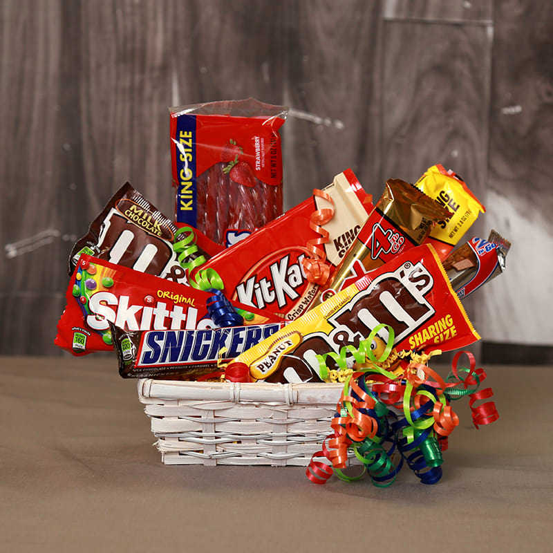 What A Sweet Gift! - What could be better than a basket full of candy!  Each candy bouquet is custom made, so substitutions may be necessary.  
