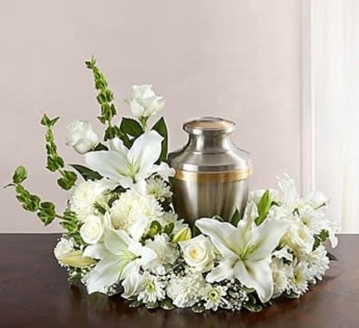 White Urn Arrangement White Urn Arrangement - Delicate tribute for a loved one.