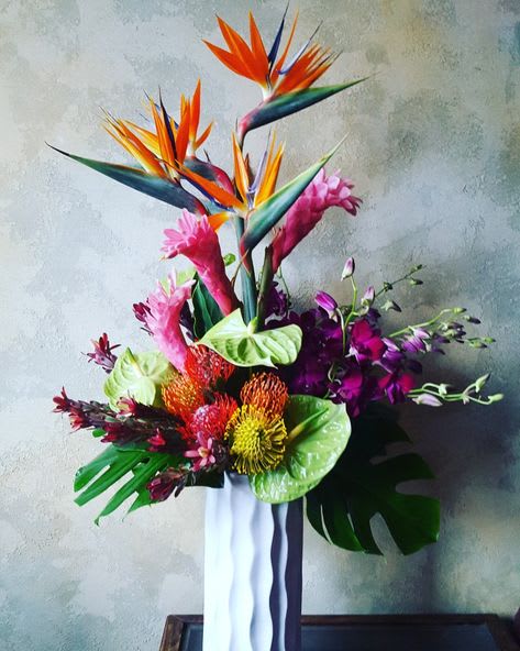 Saint Anna's island - If you want to give to someone a piece of paradise, that is the arrangement! contains of tropical flowers such as birds of paradise, proteas and orchids. 