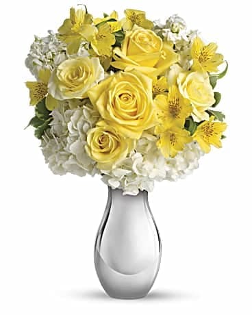 So Pretty In Yellow Bouquet - She may call this the prettiest bouquet she's ever received - for good reason. Soft yellow roses, white hydrangea and other are favorites beautifully arranged in a sparkling Silver Reflections vase. No question about it, that is PRETTY!  The spectacular bouquet includes white hydrangea, light yellow roses, yellow alstroemeria and white stock accented with fresh greenery.