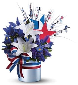 Red, White and Blue Fireworks Bouquet - A great gift for patriots! This dynamic gift delivers a passionately patriotic bouquet in a satiny blue cylinder vase.