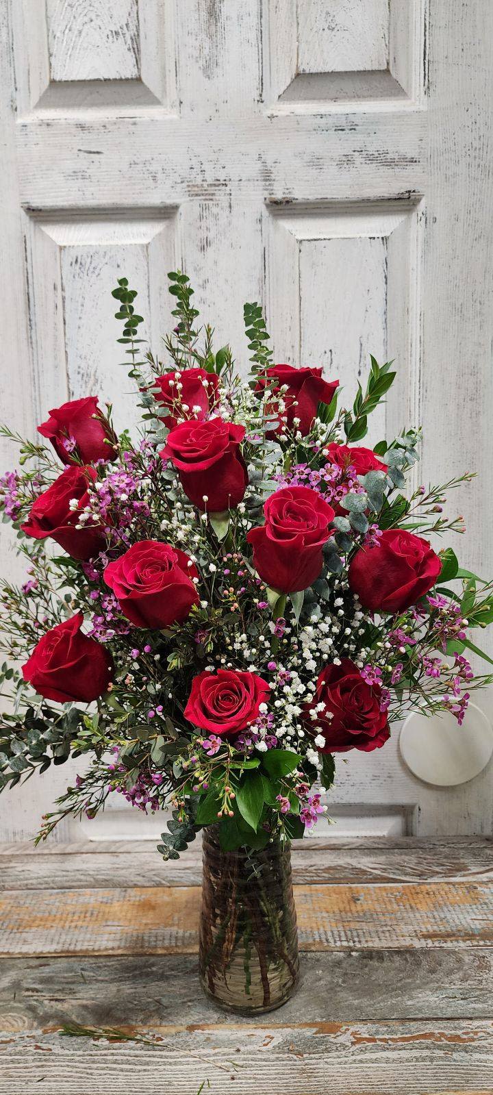 Red Rose Dozen Red Rose Dozen - 12 Beautiful long stem red roses mixed together with different textures of green and fun filler! Perfect for the Holiday to come ^_^