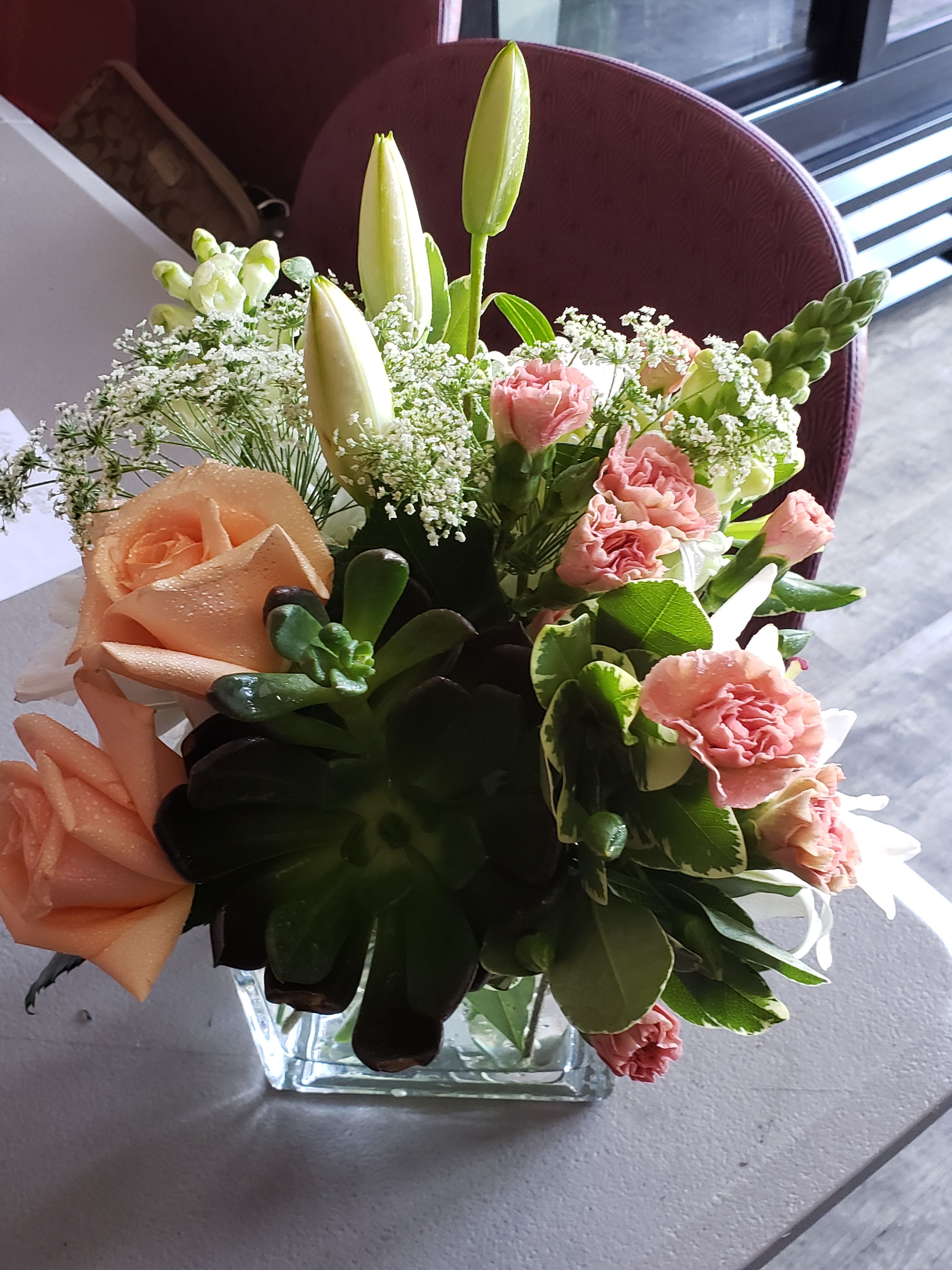 reflection - peach roses and white lilies
