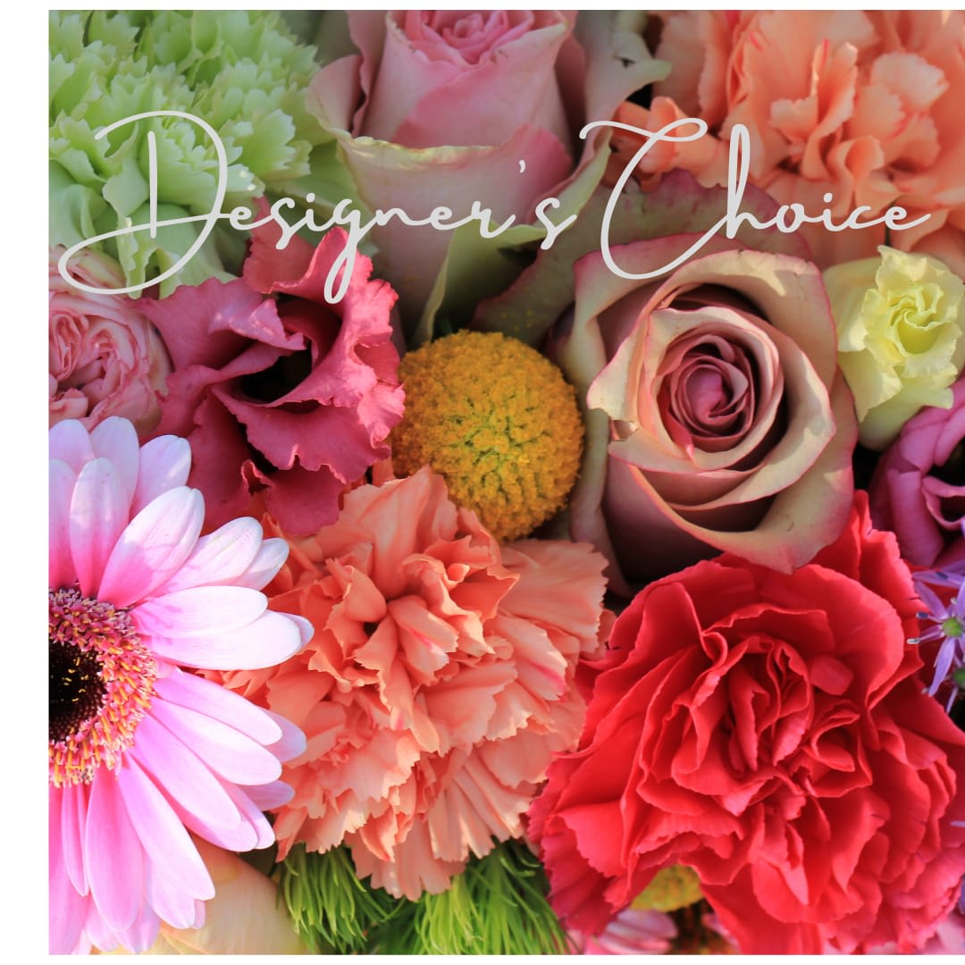 Designer's Choice Spring Mix in a vase by Blooming Canyon  - A bright and colorful design with a best blooms to sure make anyone smile. Make a memorable statement and let one of our floral experts select the freshest flowers in season. 