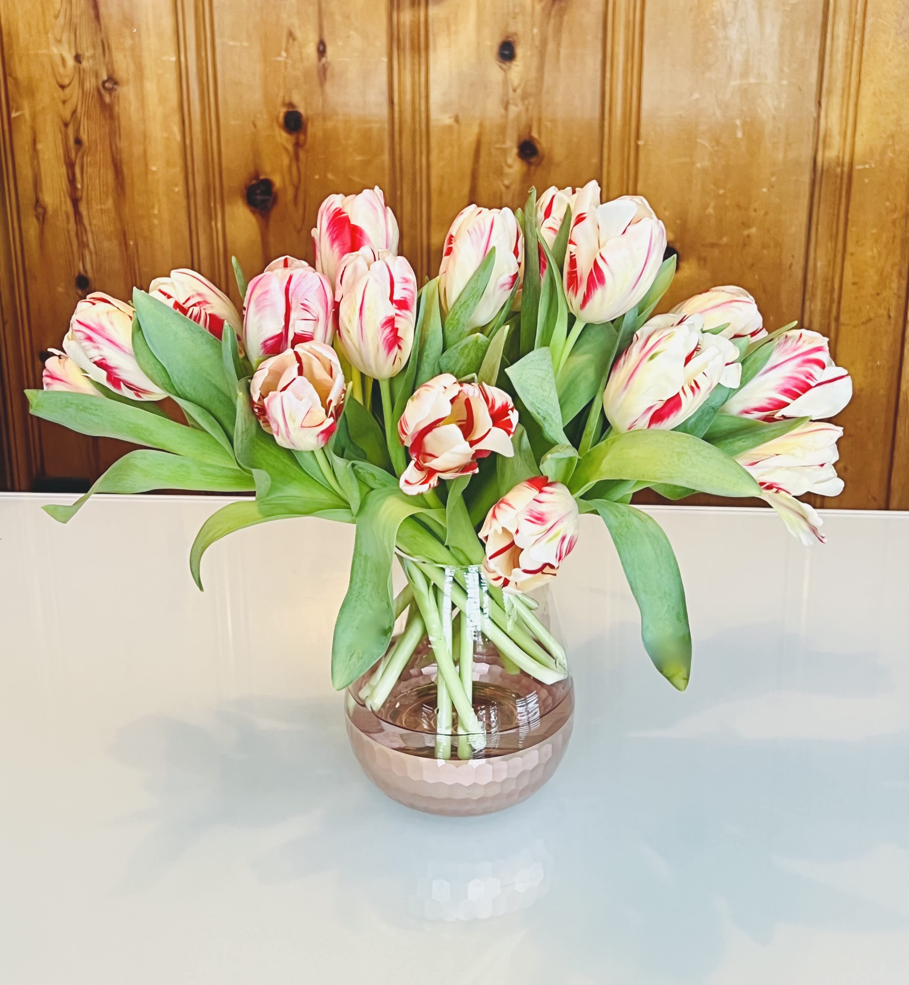 If it's not Dutch... - ... it's not much. thats the saying when it comes to Tulips. These are the creme de la creme all the way from Holland. 20 stems of large ParrotTulips in beautiful glass vase.