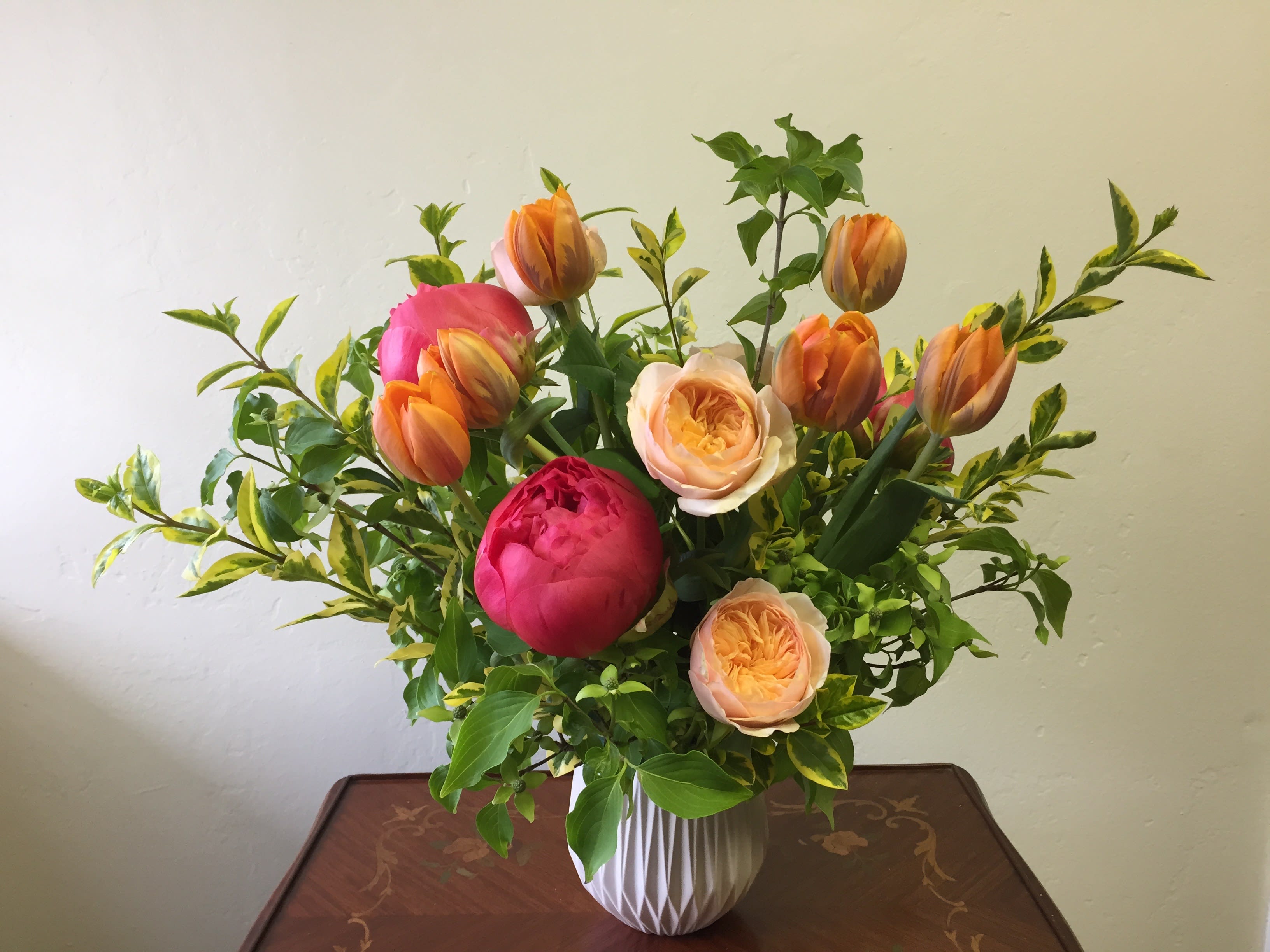Rainbow Sorbet - It's hard not to smile at the sight of peonies, tulips and garden roses.  Lovely colors of peaches, raspberries and papaya come together like rainbow sorbet.  