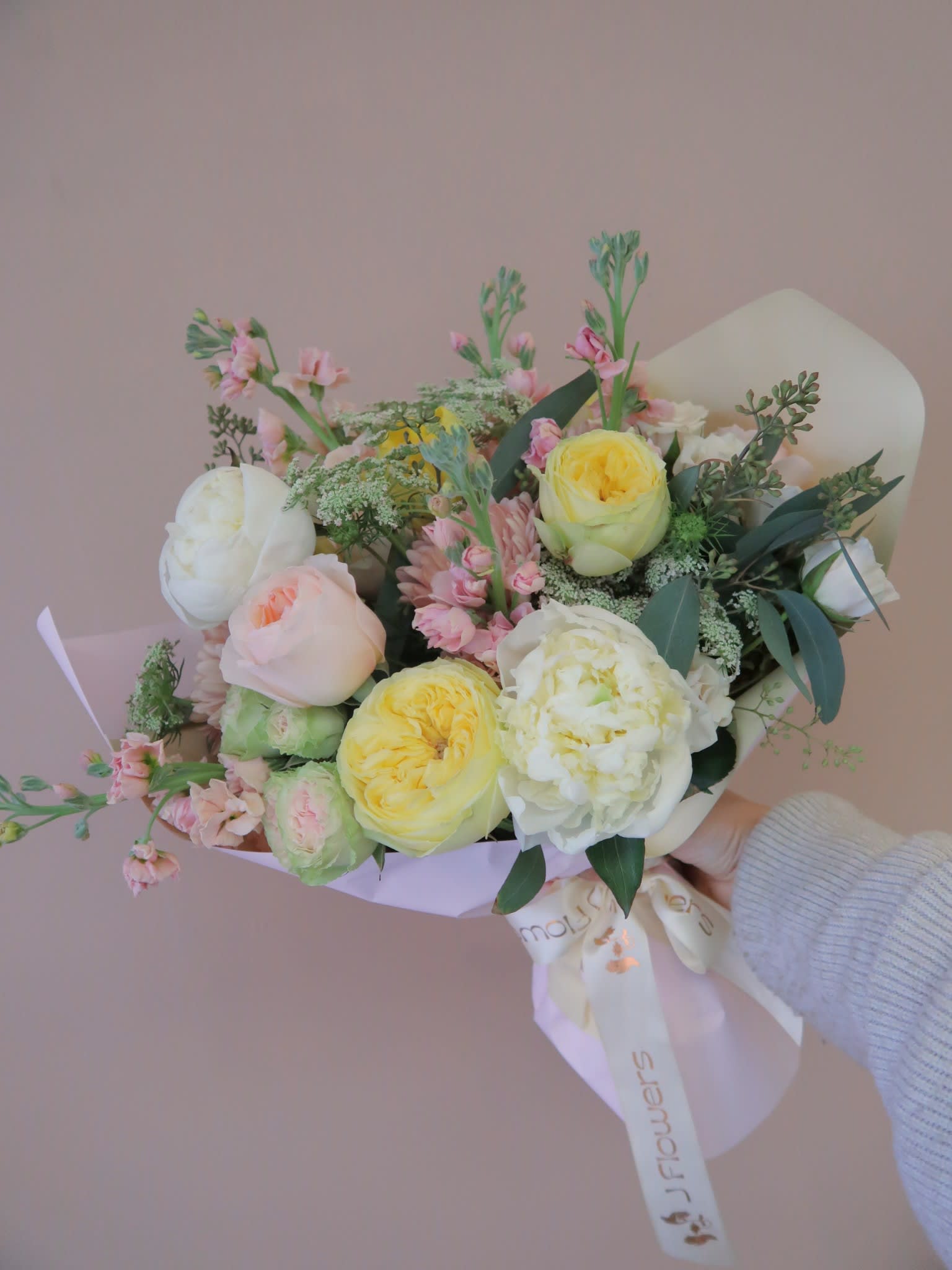Candy Hearts Bouquet - An assortment of soft pastel colors to keep it real sweet and romantic. Comes wrapped in premium paper. (Bouquet comes with stems wrapped in a compostable sponge with water) 