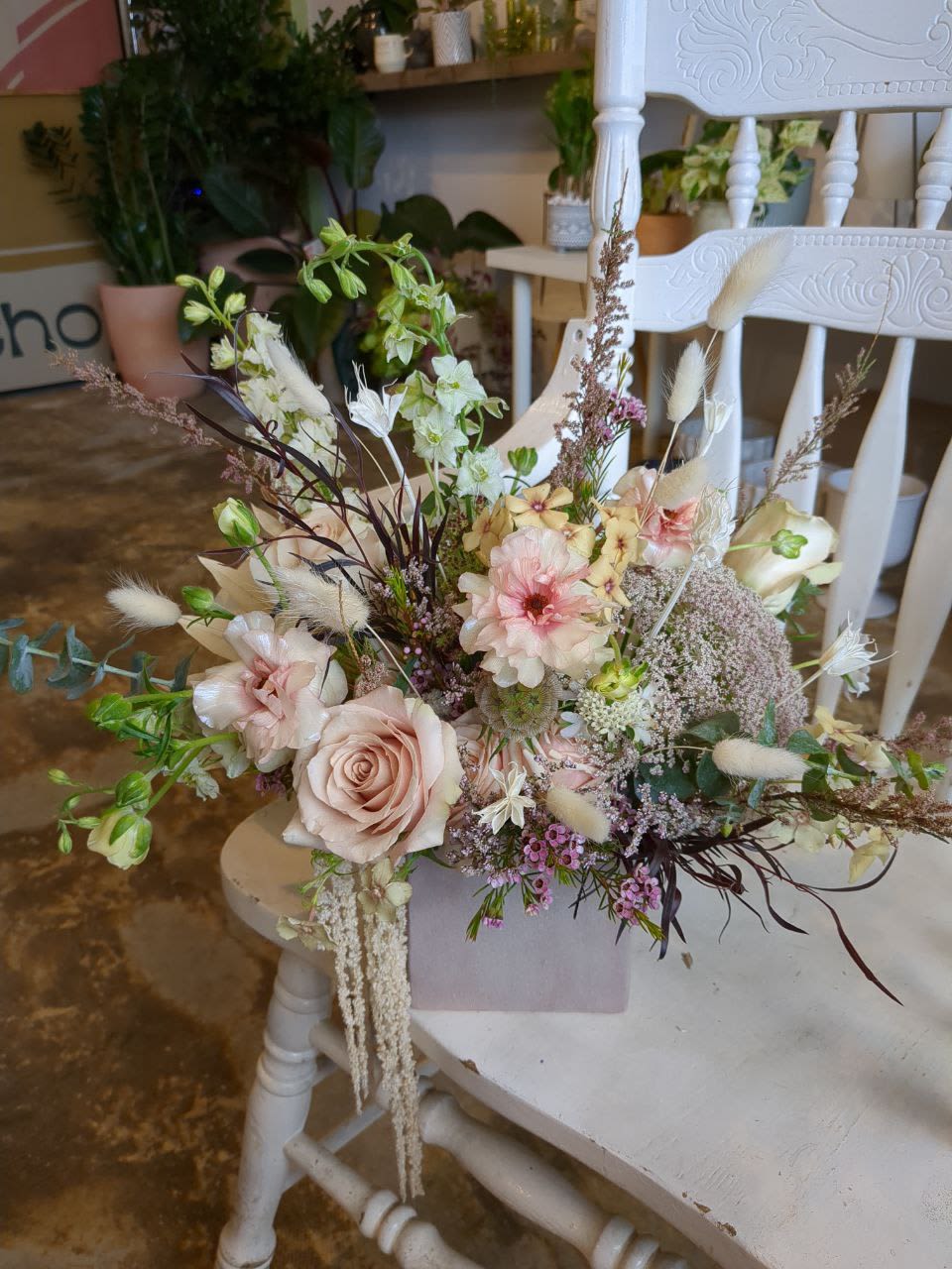 Soft Rose - A combination of soft toned fresh flowers and neutral dried flowers that comes in a dusty rose clay vessel.   *please note that not all the same flowers may be available to be included but we will always keep the overall look and feel in cases of substitution. 