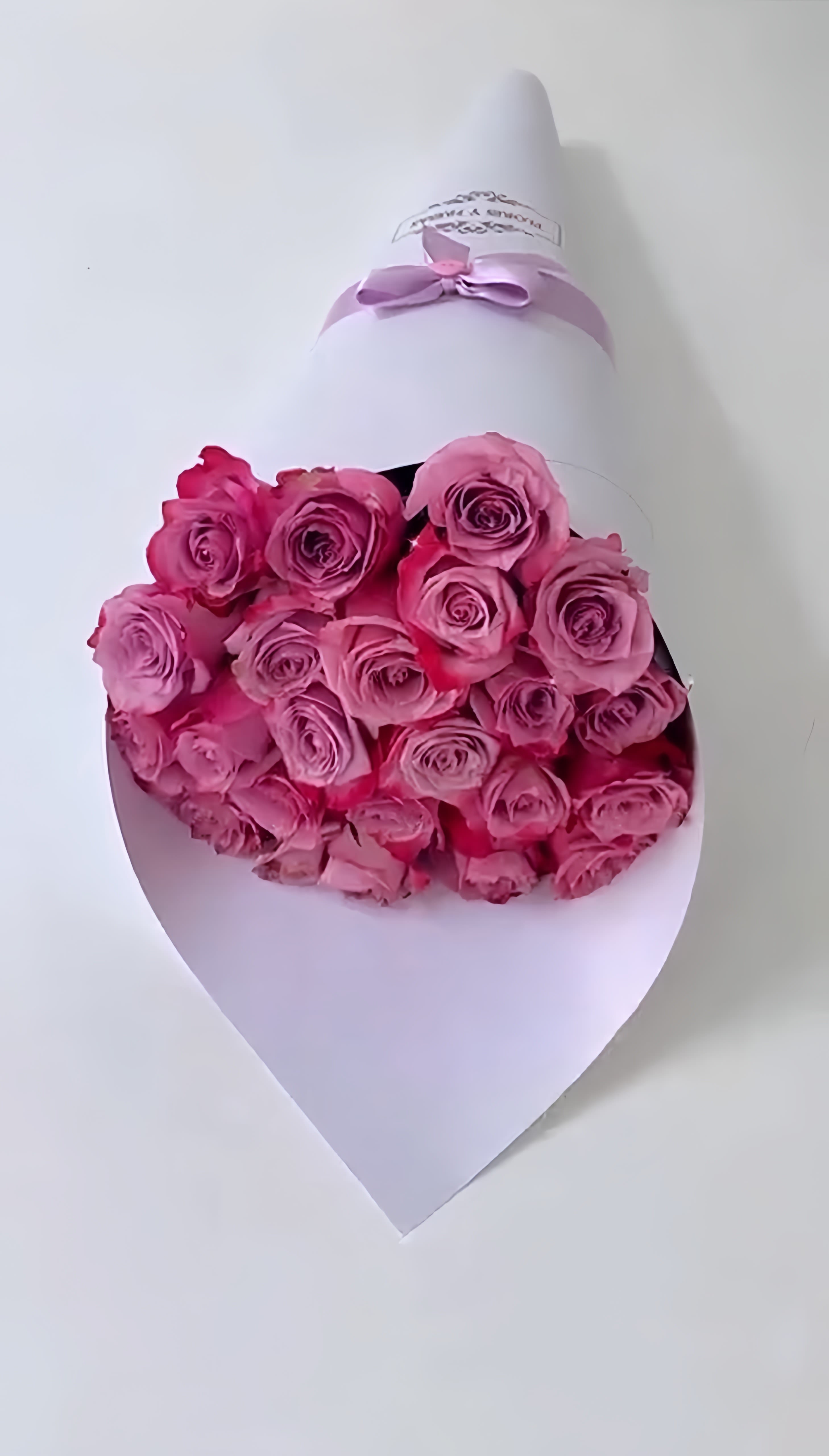 purple cone purple cone - A beautiful bouquet of purple and white roses, the perfect detail to surprise that special person.
