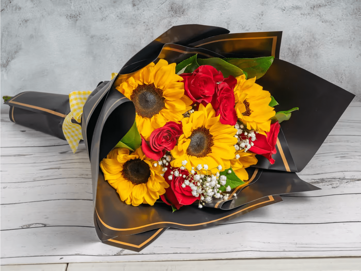 Golden Romance - A cheerful wrapped bouquet featuring vibrant sunflowers paired with elegant roses, creating a warm and sunny combination perfect for any occasion.