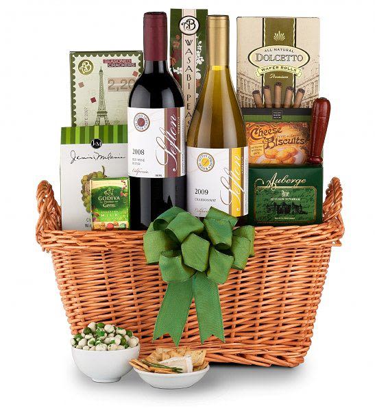 Red &amp; White Wine Gift Basket - Can't decide between red or white wine?...This basket is for you! Give the gift of both!! A bottle of red wine and white wine paired with an assortment of cheese, crackers and snacks, this basket is sure to leave a lasting impression.  Basket includes bottle of red wine, a bottle of white wine, an assortment sweet and savory snacks. Gift baskets are hand-designed so items in basket may vary based on availability.