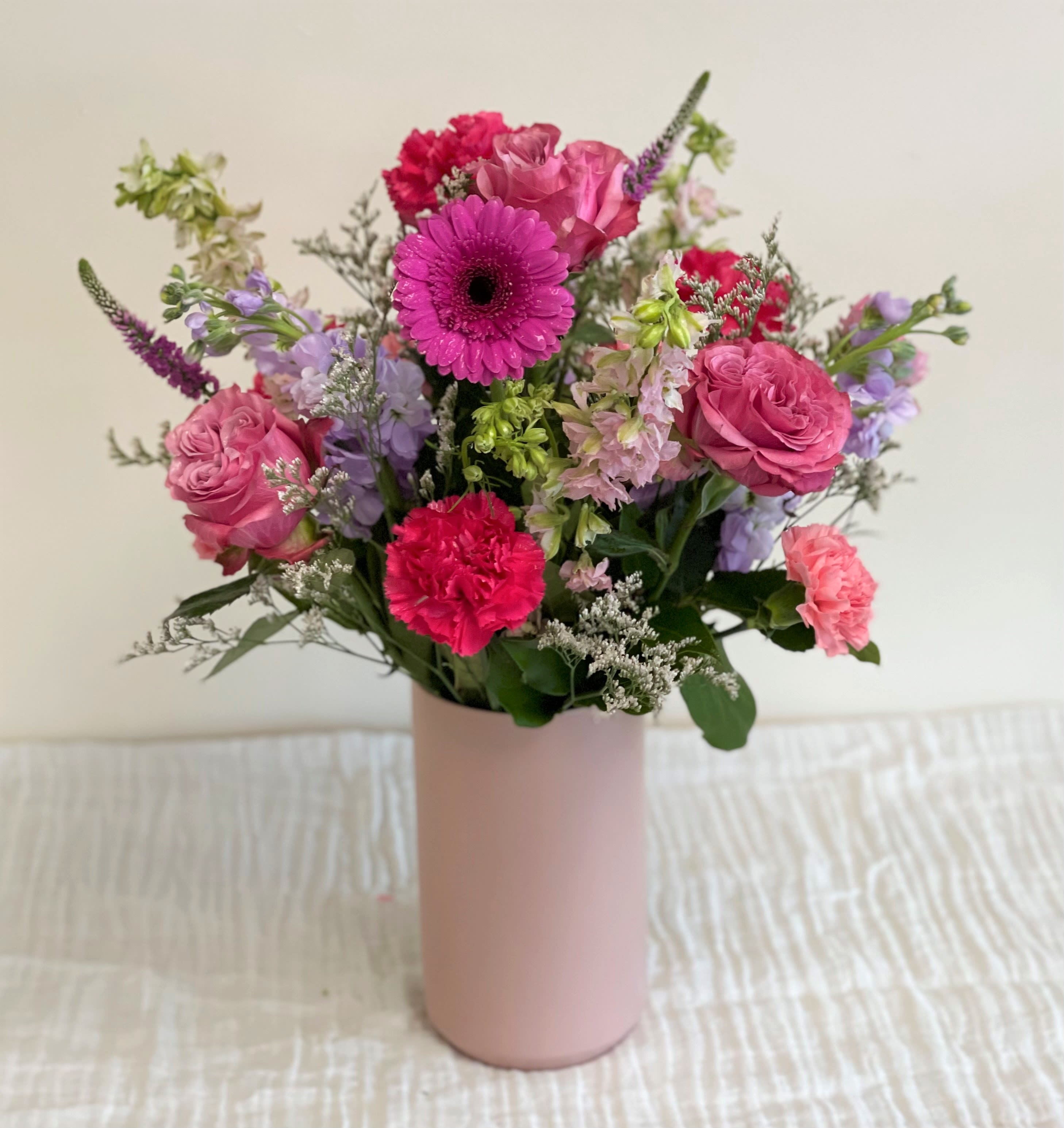 Monochromatic Pink Monochromatic Pink - A splash of pink and more pink. In a lovely ceramic vase they will want to keep and reuse again and again.