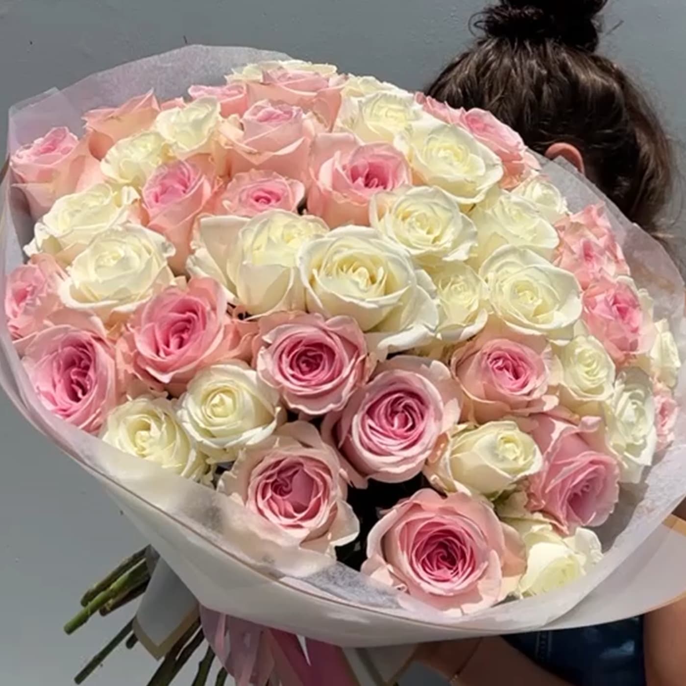 50 Rose Bouquet 50 Rose Bouquet - 50 rosés nicely arranged and wrapped in paper. Please let us know under special instructions what color(s) of roses you would like us to use on your bouquet. (Limit 2 colors per bouquet)