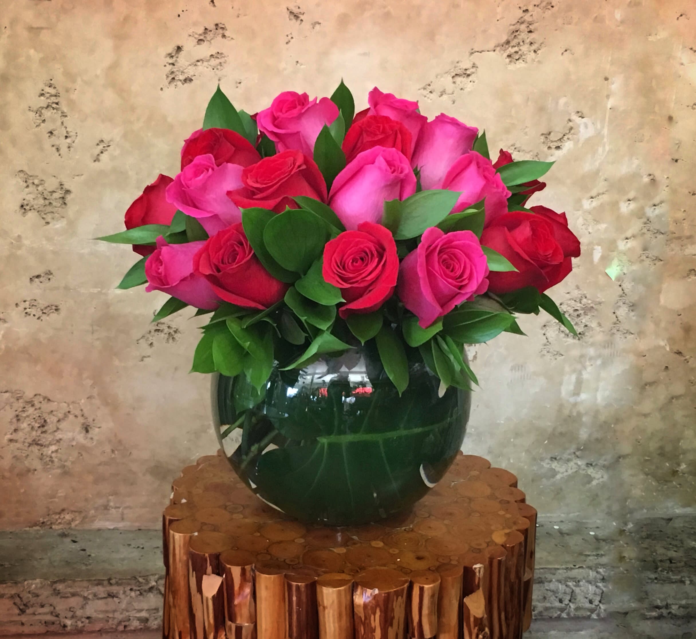 Rose Bowl - Two dozen premium Roses (Red, Pink or mix) with nice leaves in glass fish bowl.