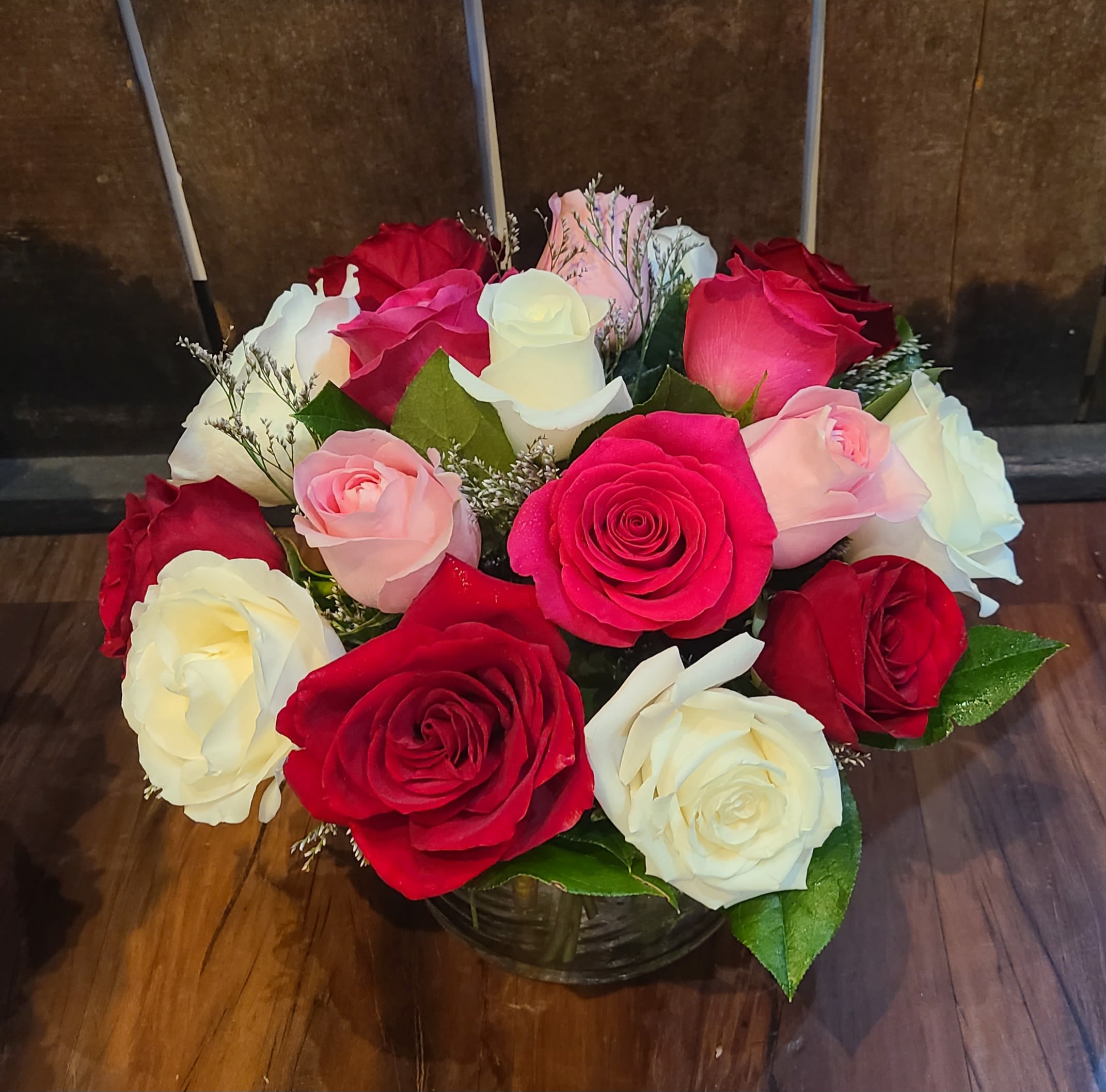 Romantic Roses - This arrangement features a variety of Equadorian roses, in a 6&quot; cylinder vase. Finished size is approximately 12x12&quot;