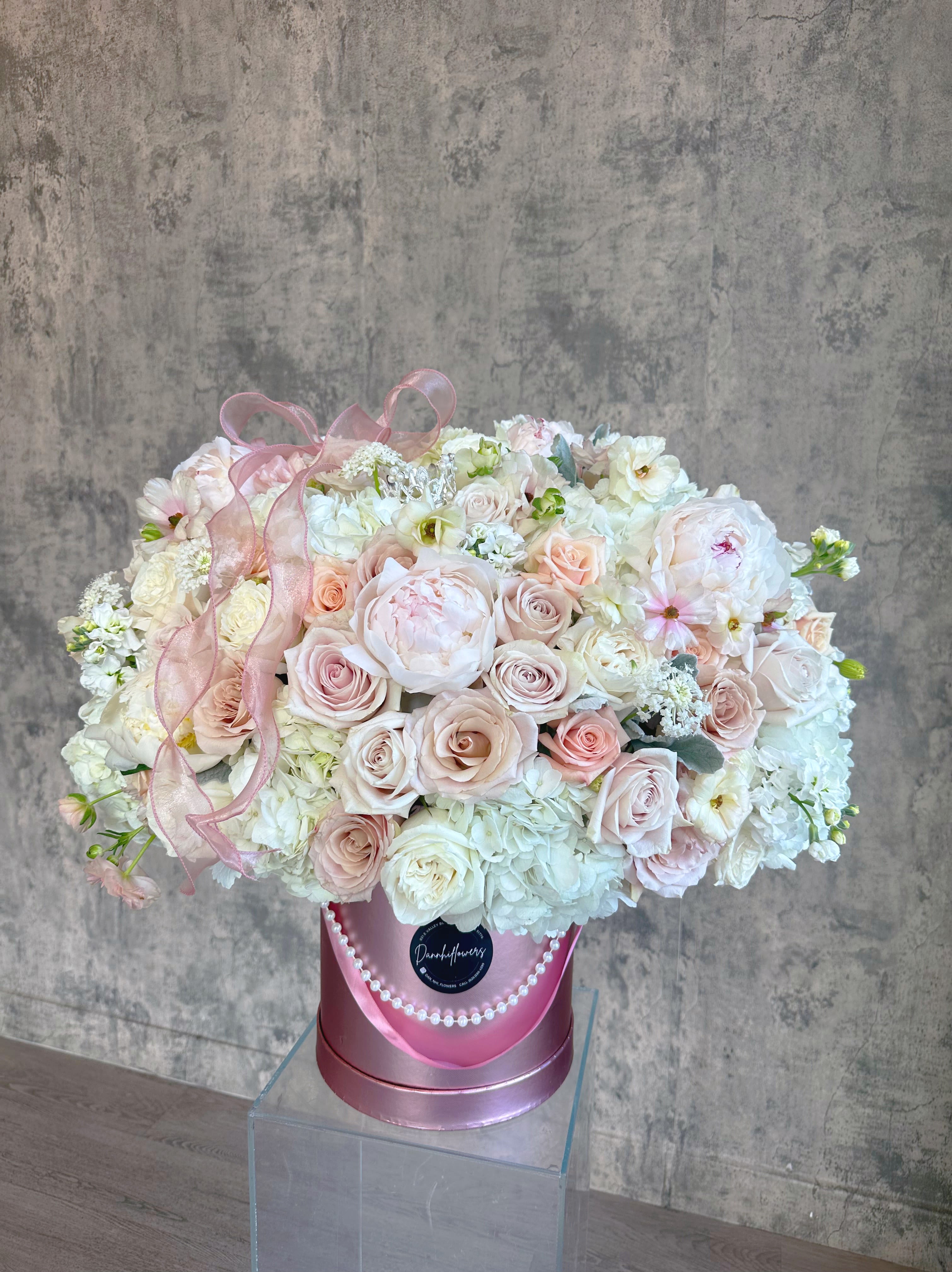 My Muse. - A statement of quiet luxury, a lush, sophisticated arrangement featuring soft, muted tones, perfect for those who love timeless elegance with a modern twist. Designed to impress with a gentle, luxurious touch of premium peonies.