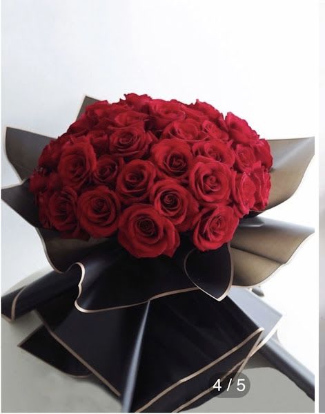 Red Roses Wrapped Bouquet Red Roses Wrapped Bouquet - This Valentine's bouquet Features Red Roses arranges and elegantly Wrapped to convey timeless love and passion. Perfect gift for Valentine's day Standard contains 16 roses every size increased will have an additional 6 roses