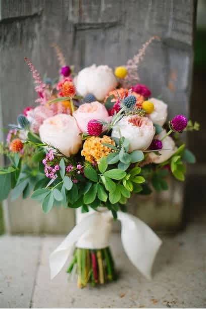 Bridal Bouquet  - This stunning Bouquet with a variety of flowers is the perfect way to say I do. Please call or schedule consultation to discuss colors 