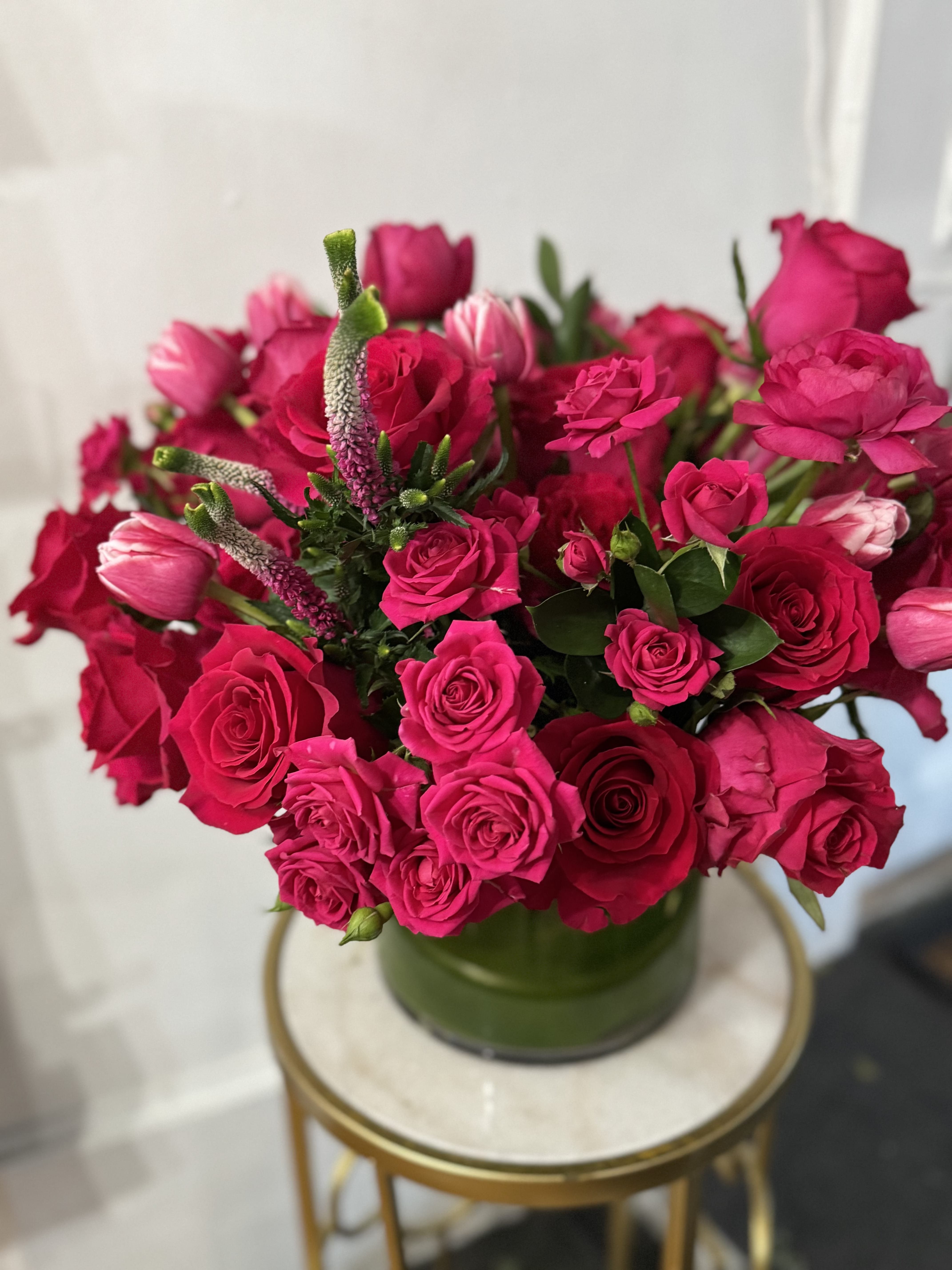 Hot Stuff  - Monochromatic and so lush that it will surely make an impressive thank you. Large statement floral set in a glass vase. We will select the very best in this palette that is available at the market.   Saturday and Same Day are available if you call the shop. If we have the materials, we will make it happen for you!  ** 415 751 2747 10:00AM -5:00PM]