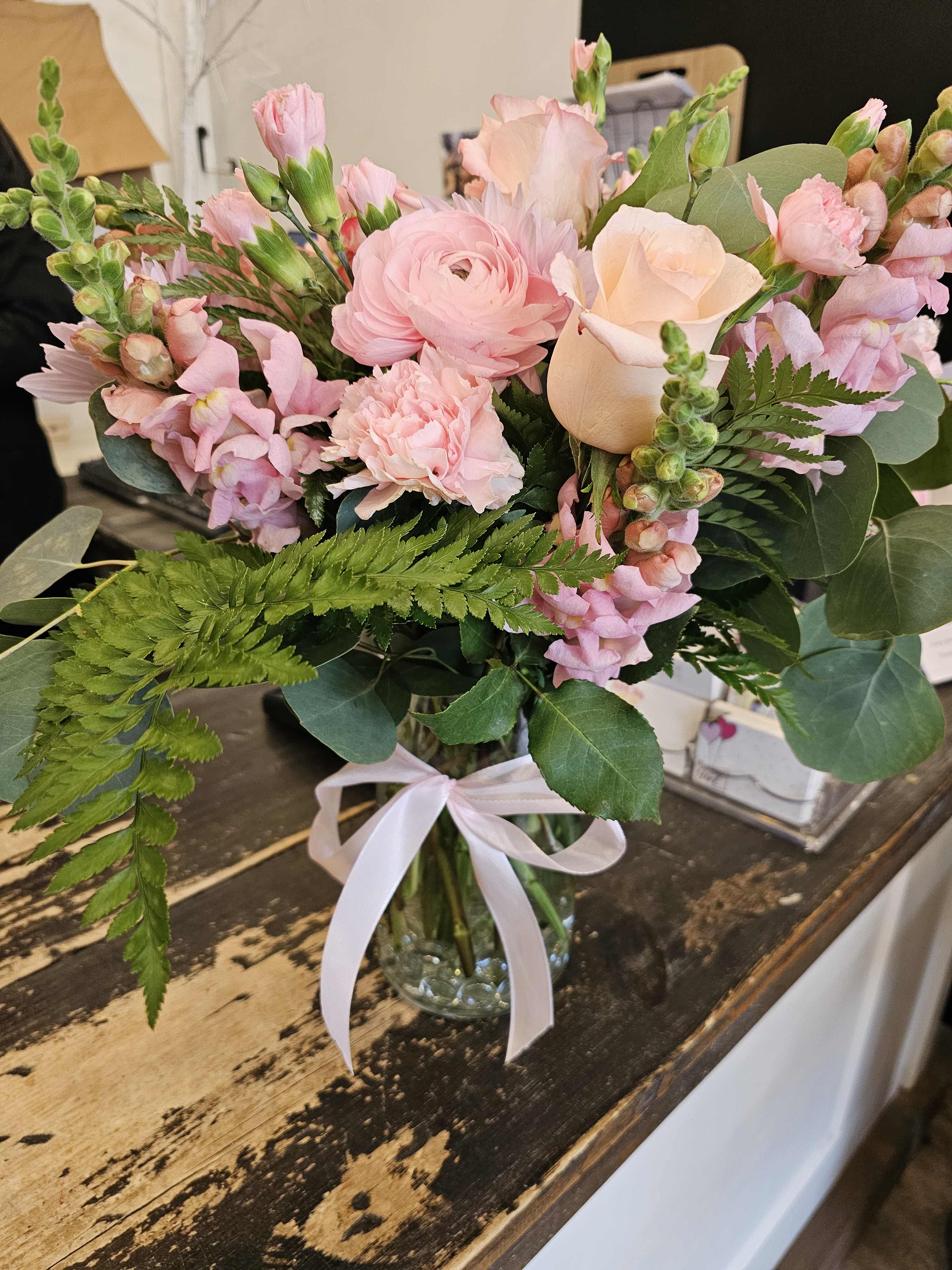 I like Pink - Pink flowers arranged in a vase for that special occasion.