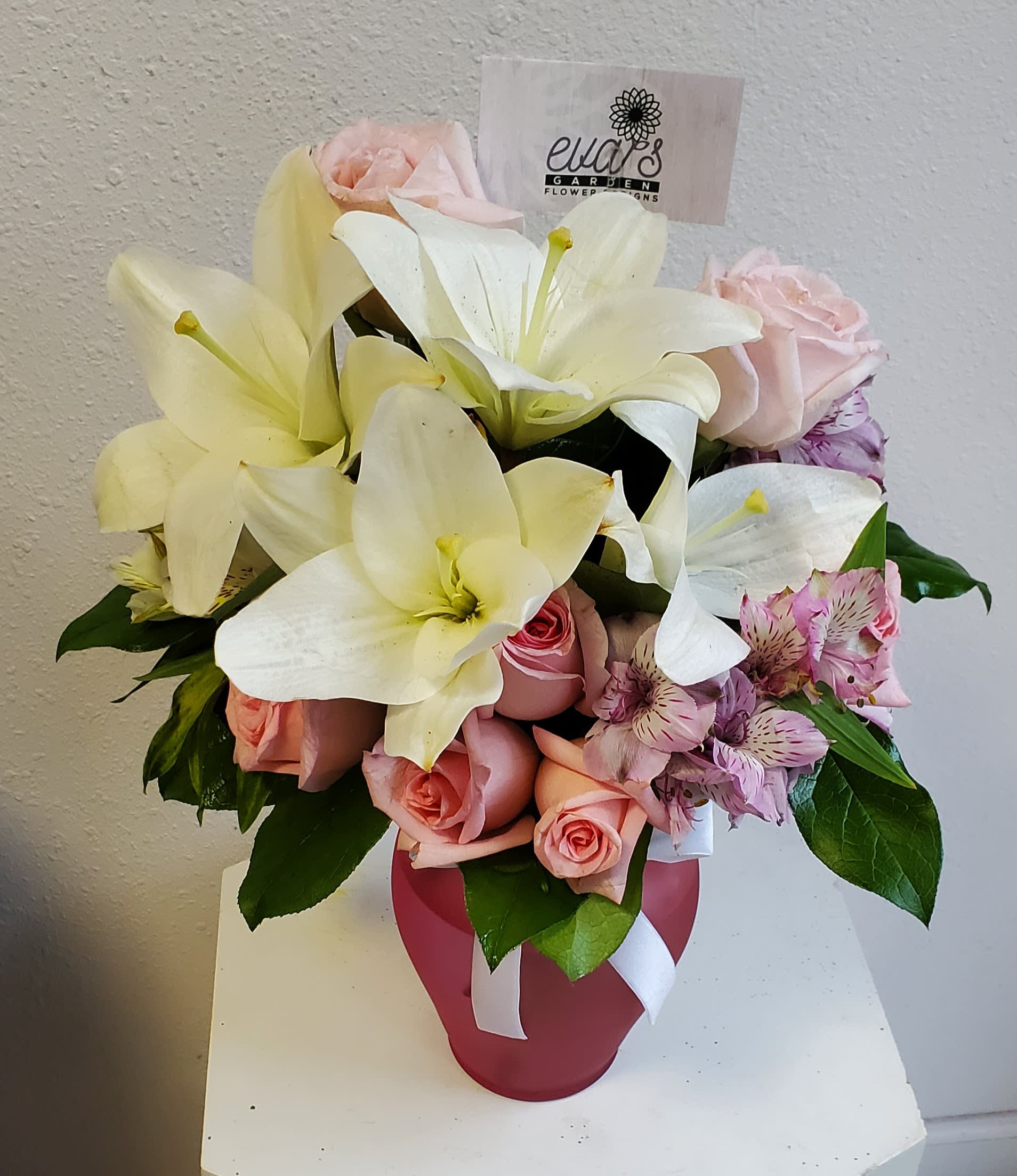 Cherished Cherished - Crystal pink, frosted vase with white lilies, pink roses, and purple/white alstroemeria.