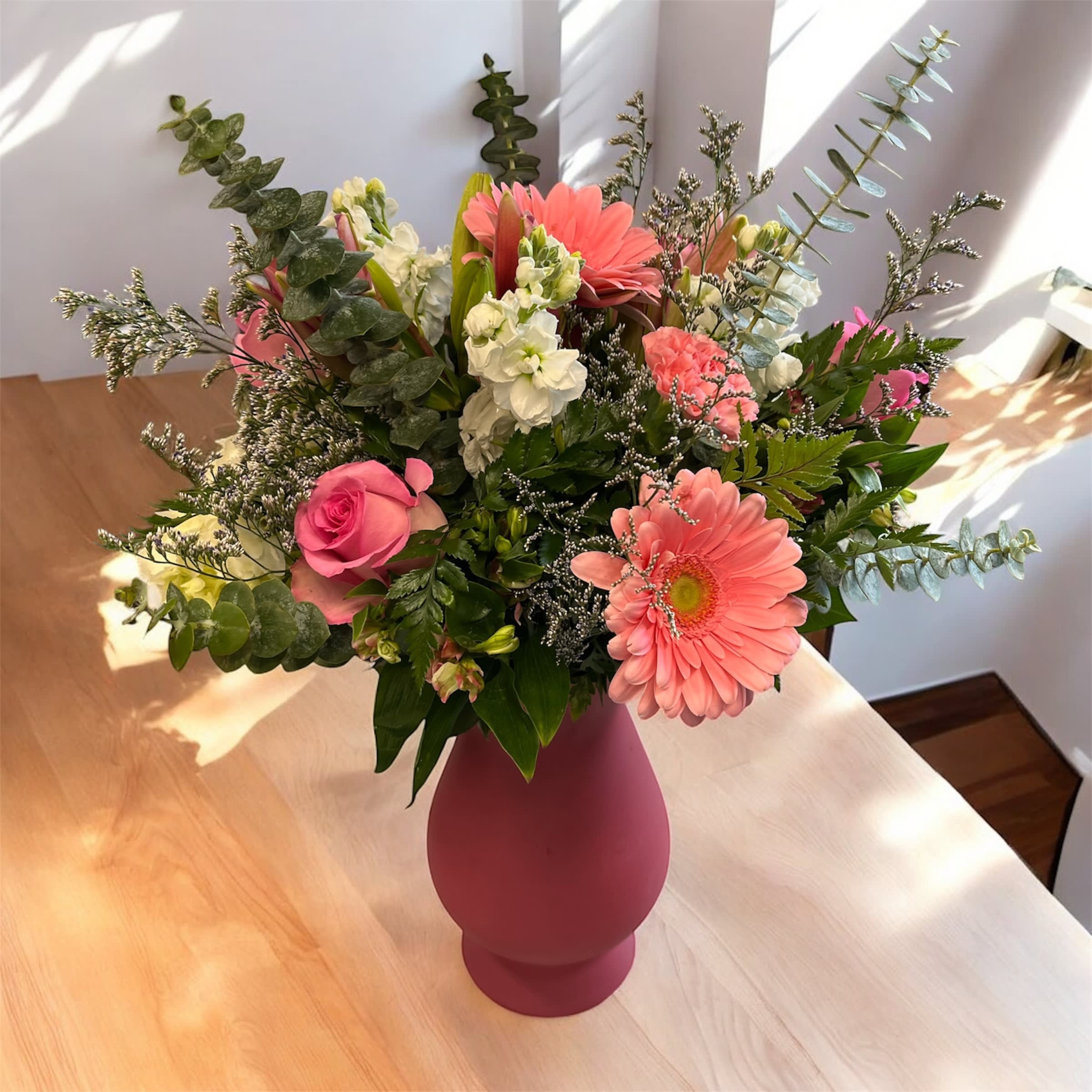 Forever Yours Arrangement - Perfect for romantic milestones or grand celebrations, &quot;Forever Yours&quot; is a striking expression of deep affection and unforgettable beauty. &quot;Forever Yours&quot; is an opulent floral arrangement that radiates elegance and timeless love.