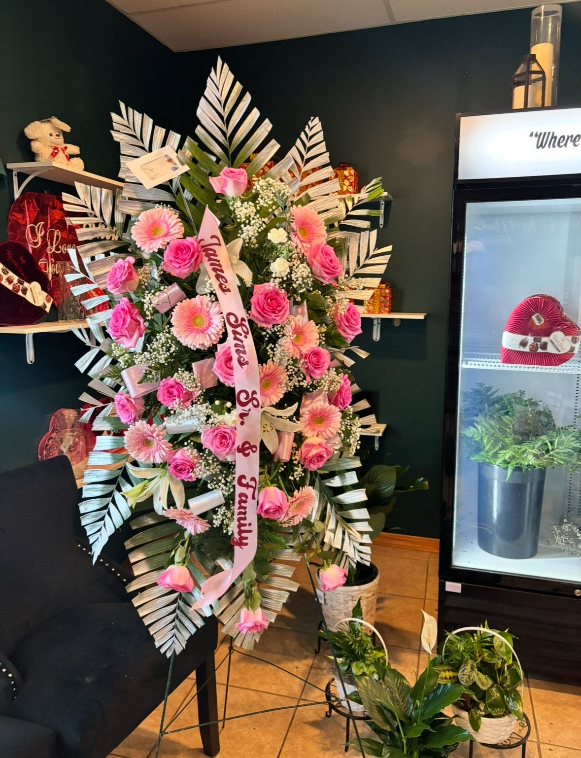 Grace in Bloom Standing Spray - Flowers: Fresh pink flowers, white lilies, and soft greenery, thoughtfully arranged to create a graceful and full standing spray.