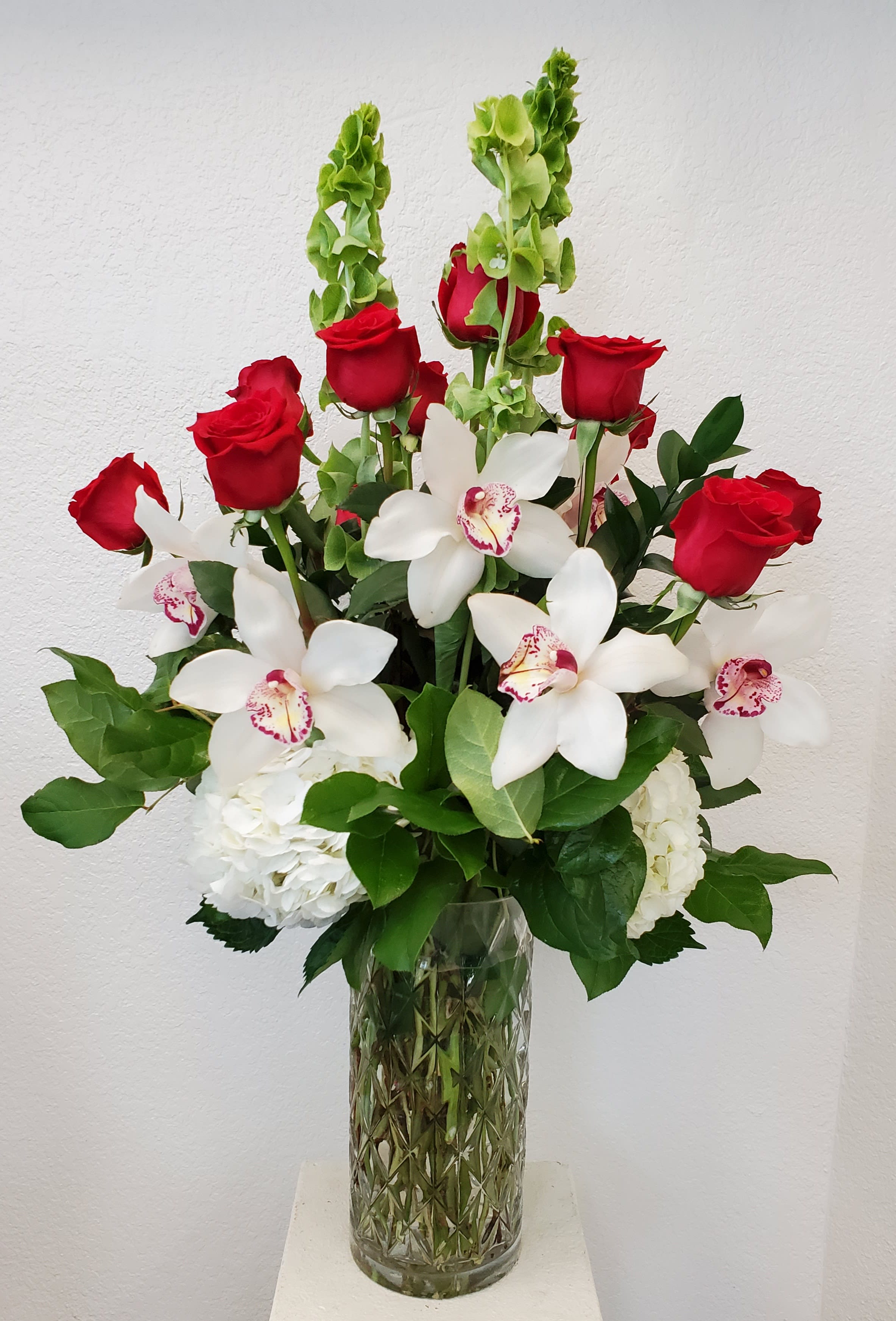 Roses hydrangeas and Orchids - dozen roses with 6 orchids and 3 hydrangeas
